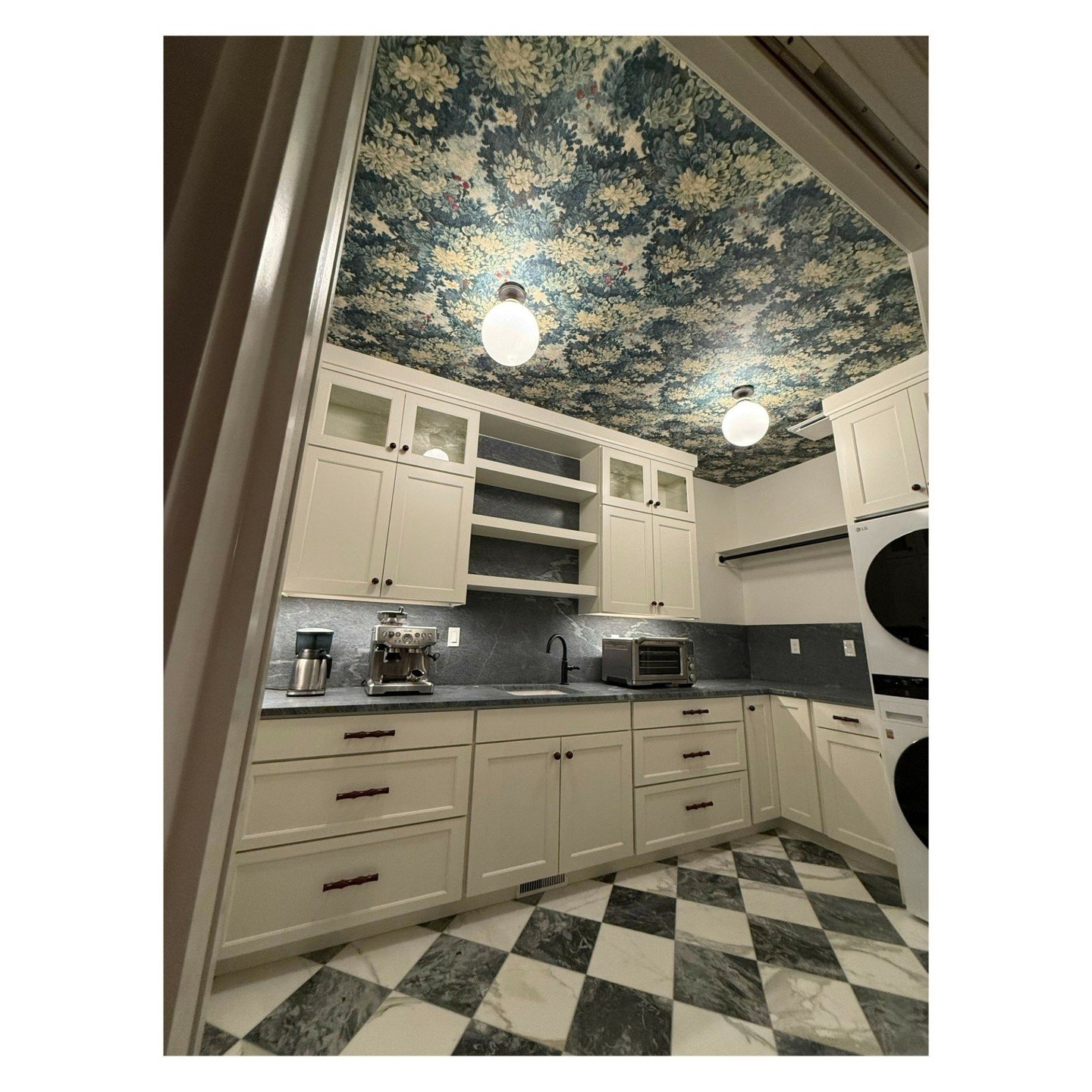 Marble checkerboard flooring, soapstone, lacquered cherry cabinet hardware and wallpaper on the ceiling.  Not dramatic at all. 💅🏻💃🏻