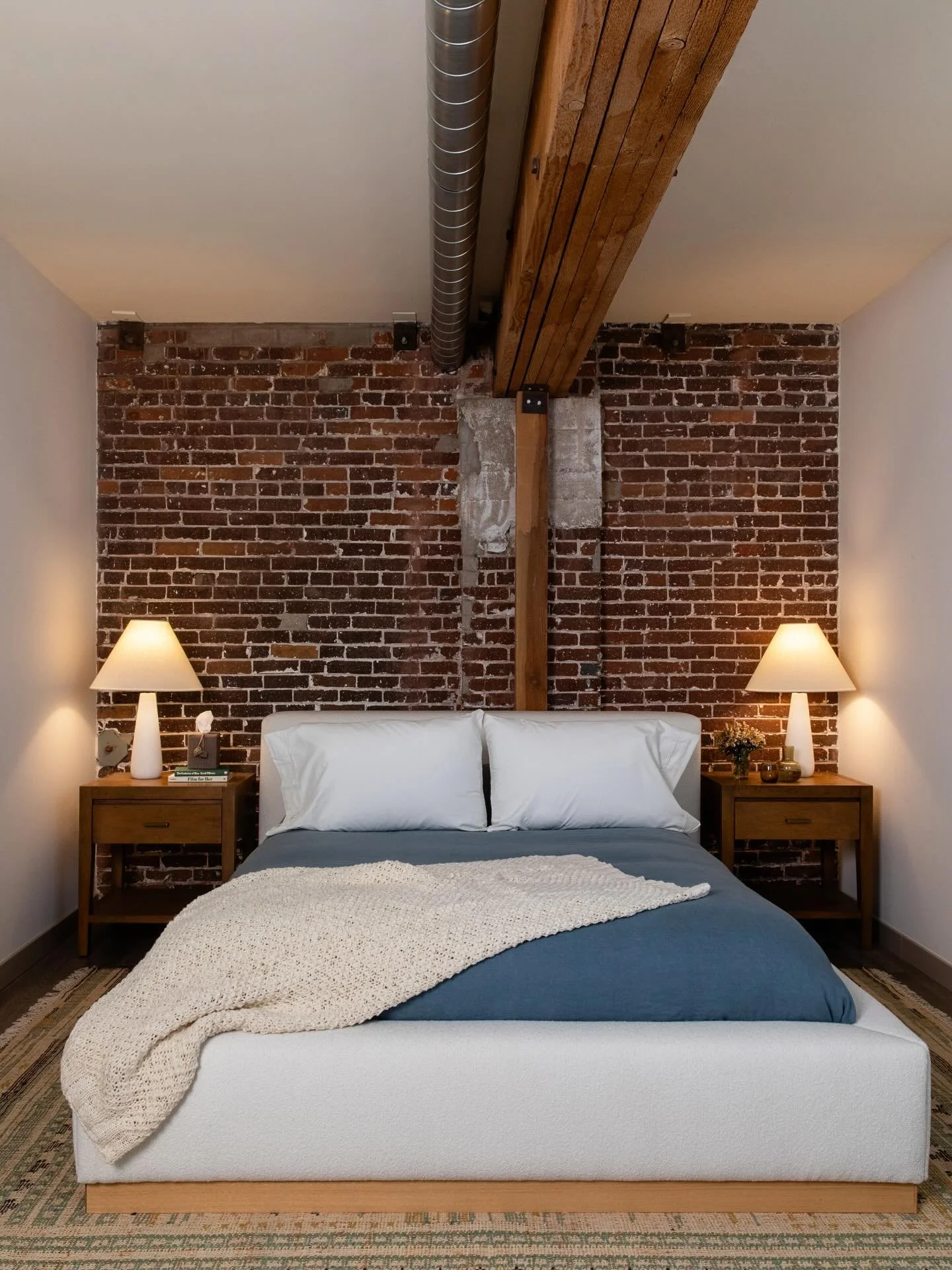 When the architecture leads, the design stays intentionally minimal in this downtown loft apartment. 
B+V 2023