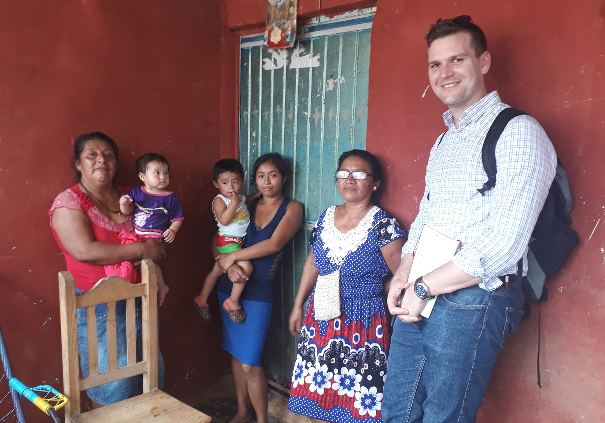 In this photo, Jonathan demonstrates cultural differences in height during a field visit with loan applicants in Veracruz, Mexico.