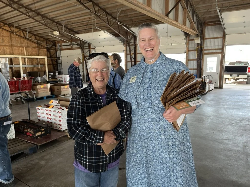 Becky Landes and Margaret Wise at Adams Cty auction.jpeg