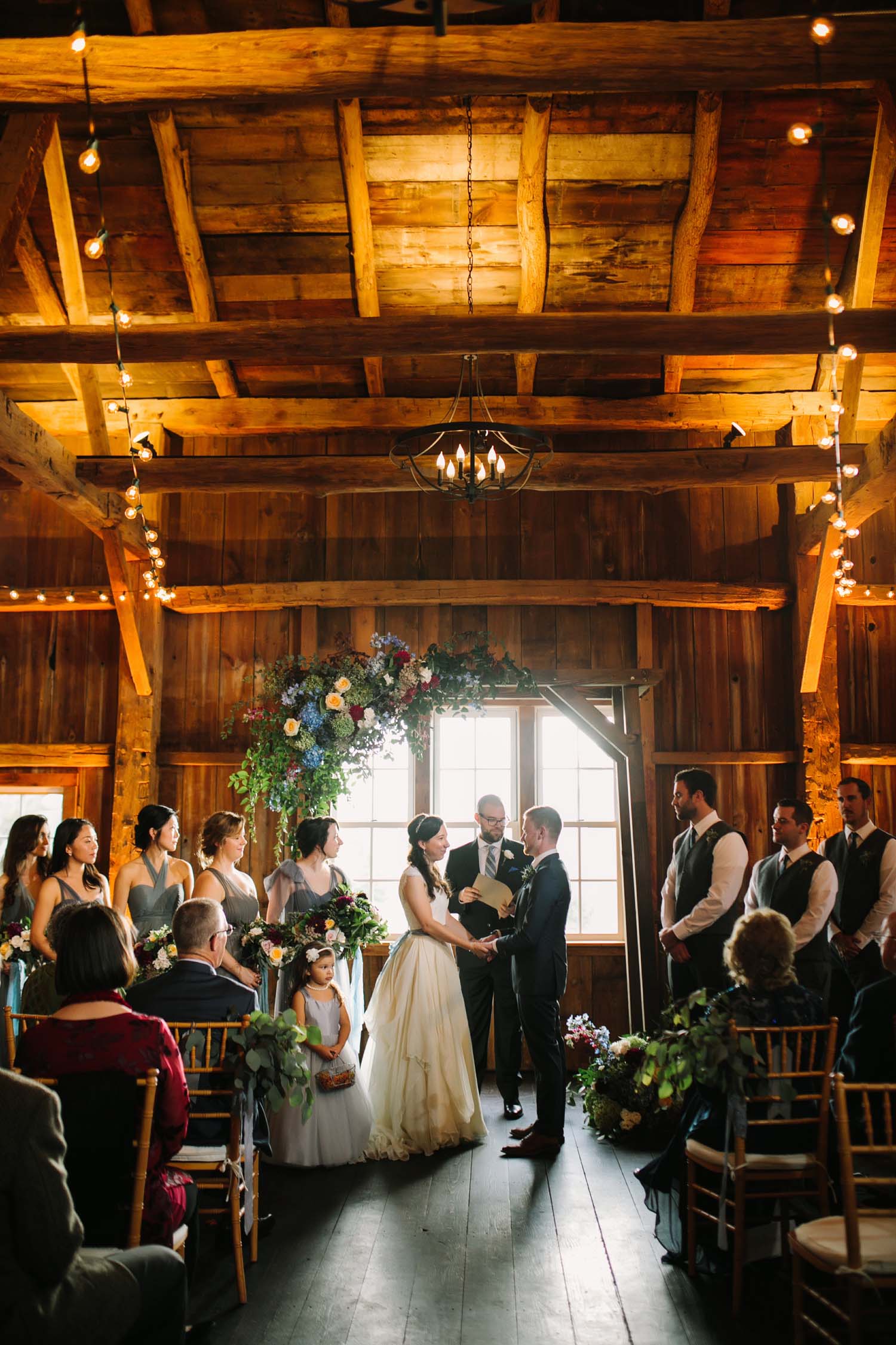 cornman farms indoor barn wedding ceremony