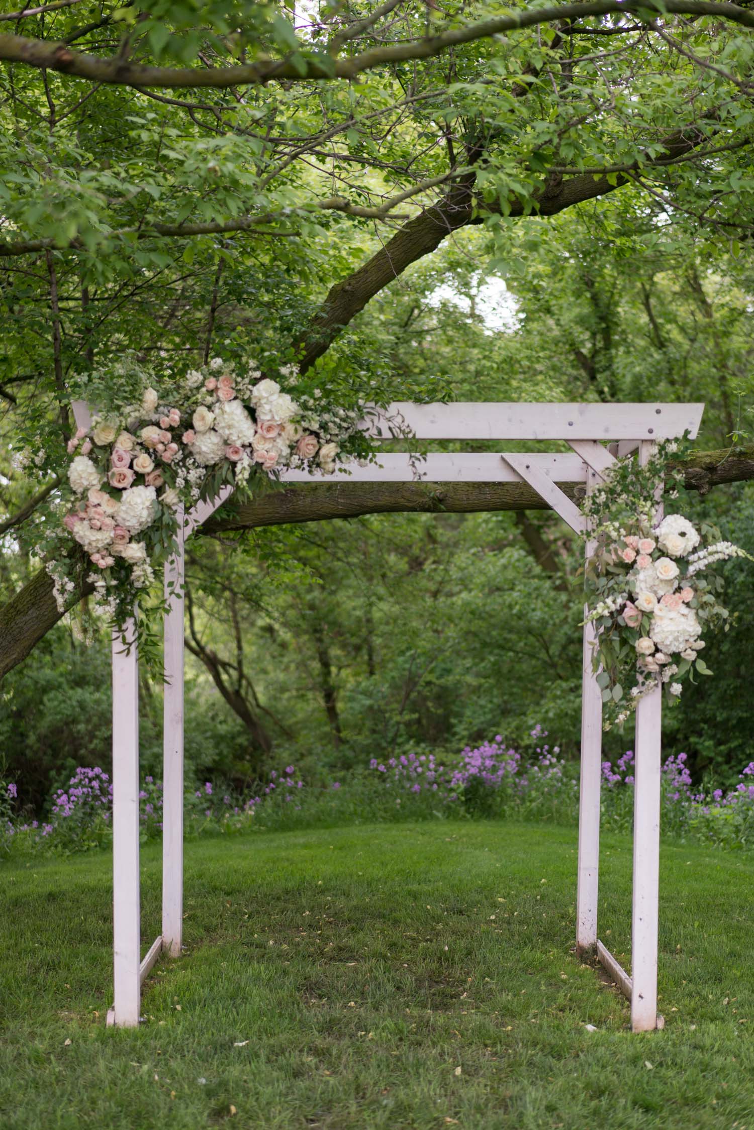 wedding ceremony arch by red poppy ann arbor