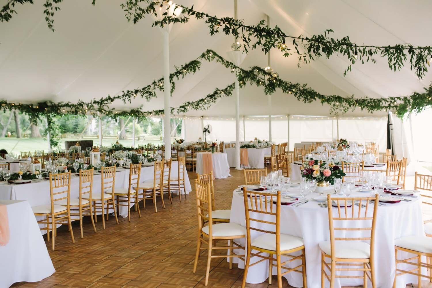 cornman farm tent with greens and foliage