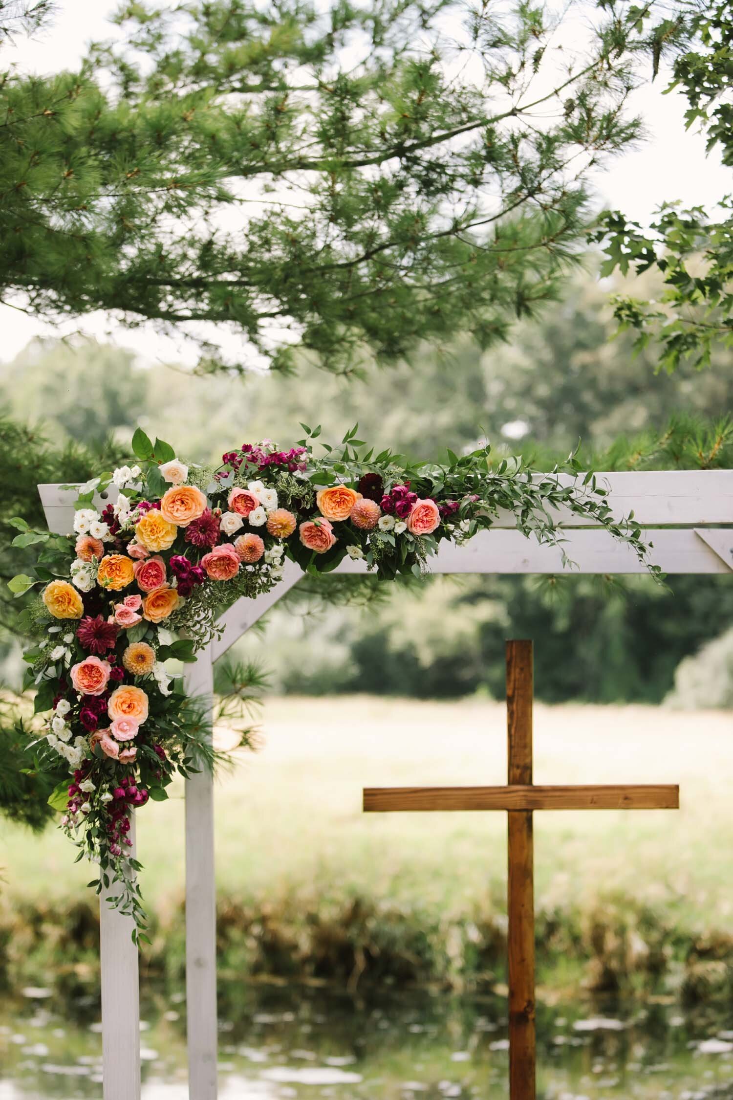 misty farm ceremony arch flowers