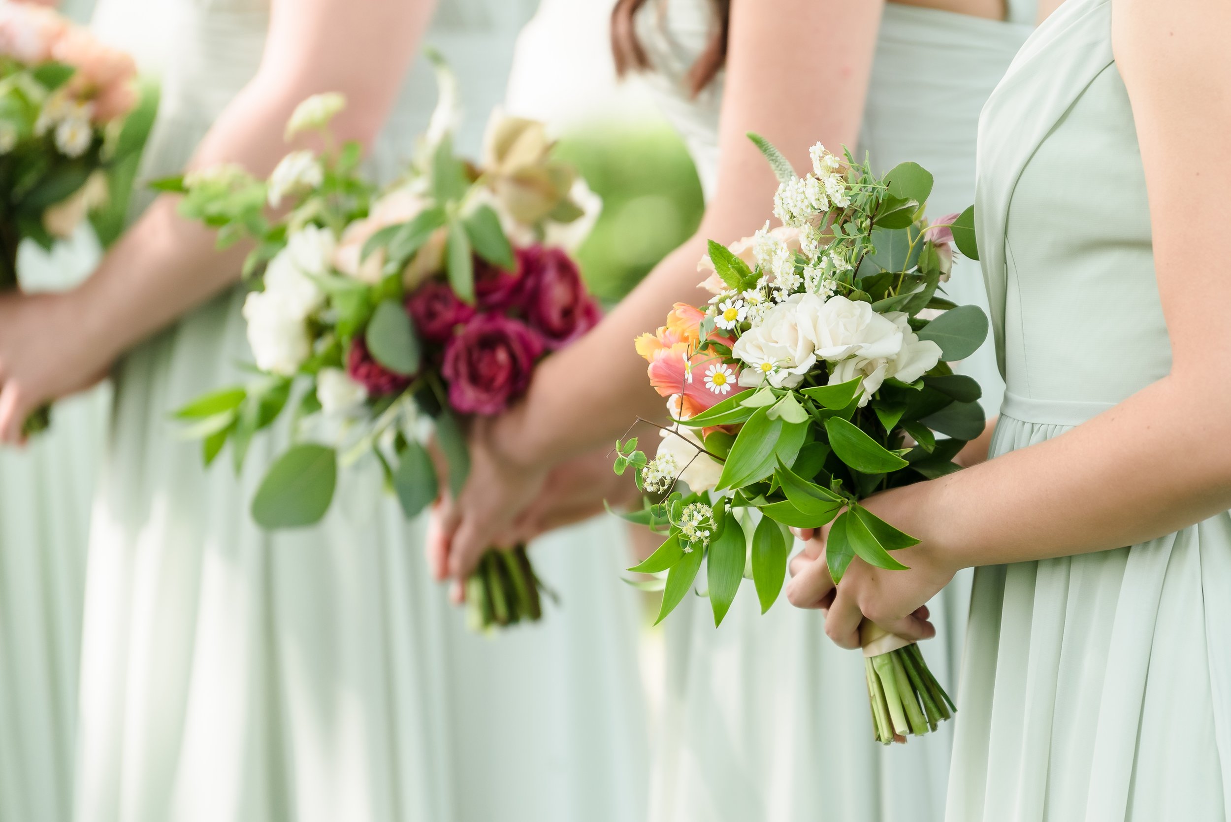 Bridesmaids bouquets at cornman farms wedding