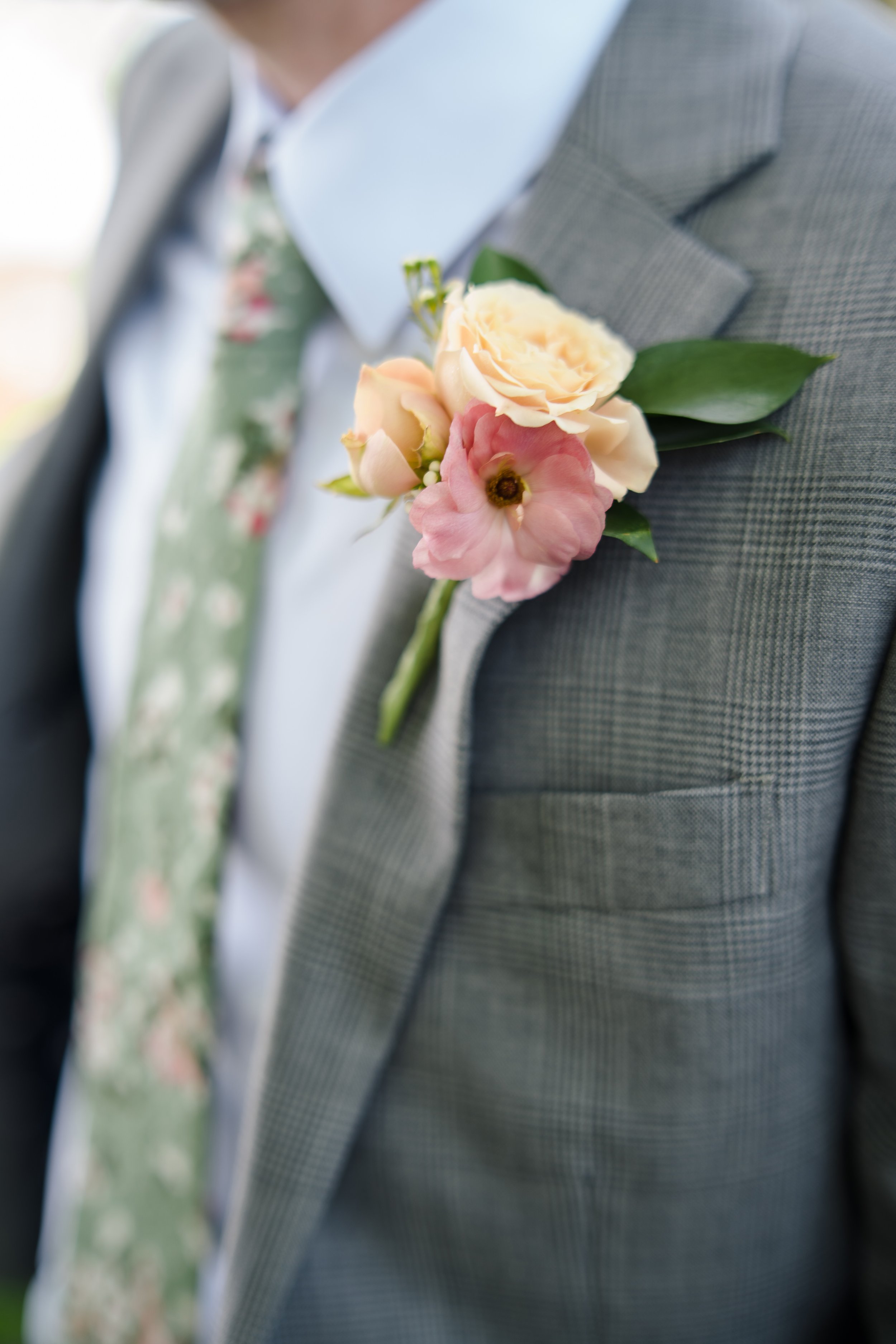 spring boutonniere by red poppy floral design ann arbor