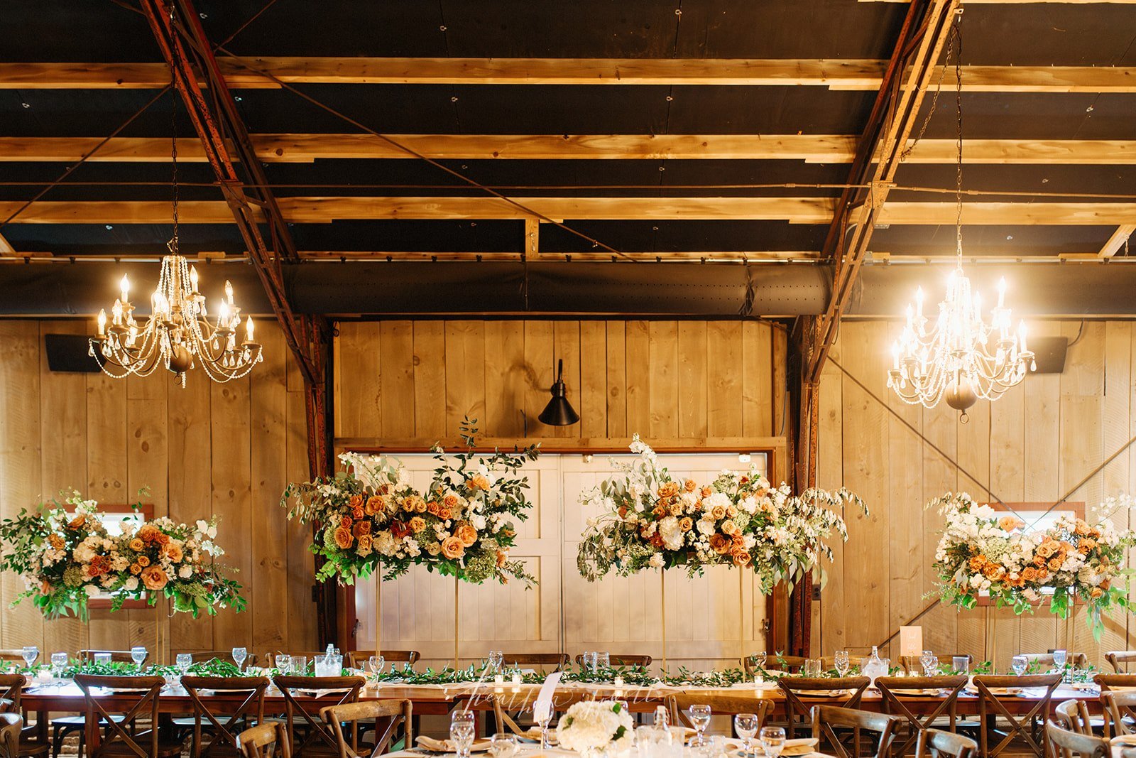 Frutig Farm the Valley reception flowers in sunset tones