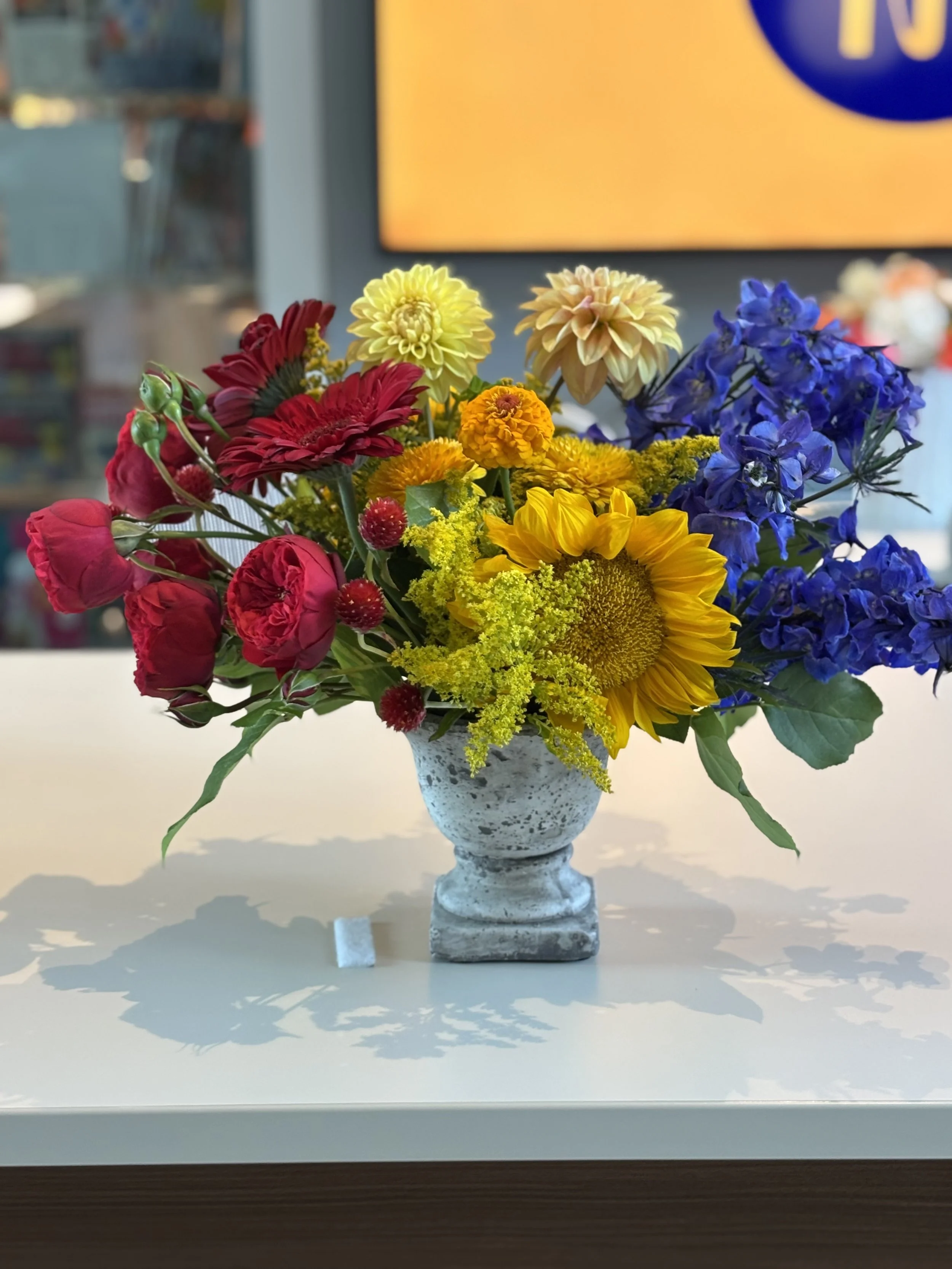 Primary Color flower arrangement at UMMA