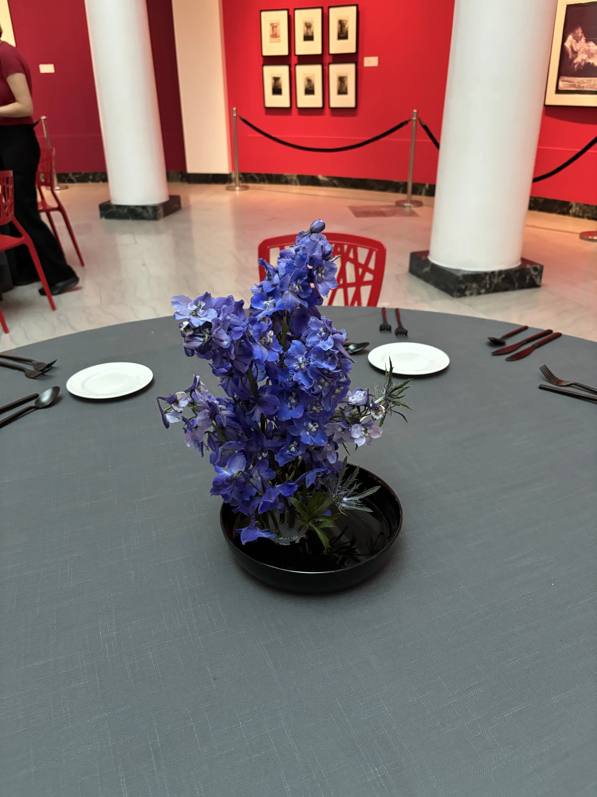 Bold blue flower centerpiece at UMMA