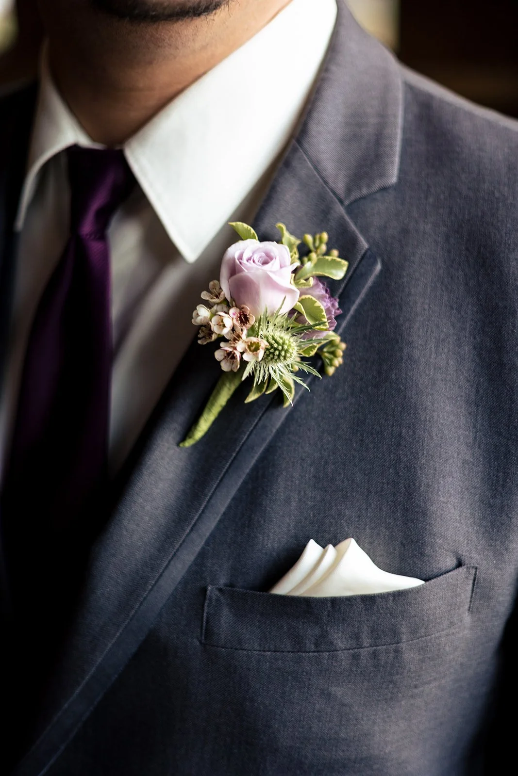 Boutonniere by red poppy floral design ann arbor florist