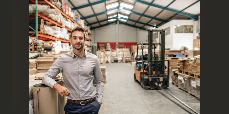 confident man in warehouse
