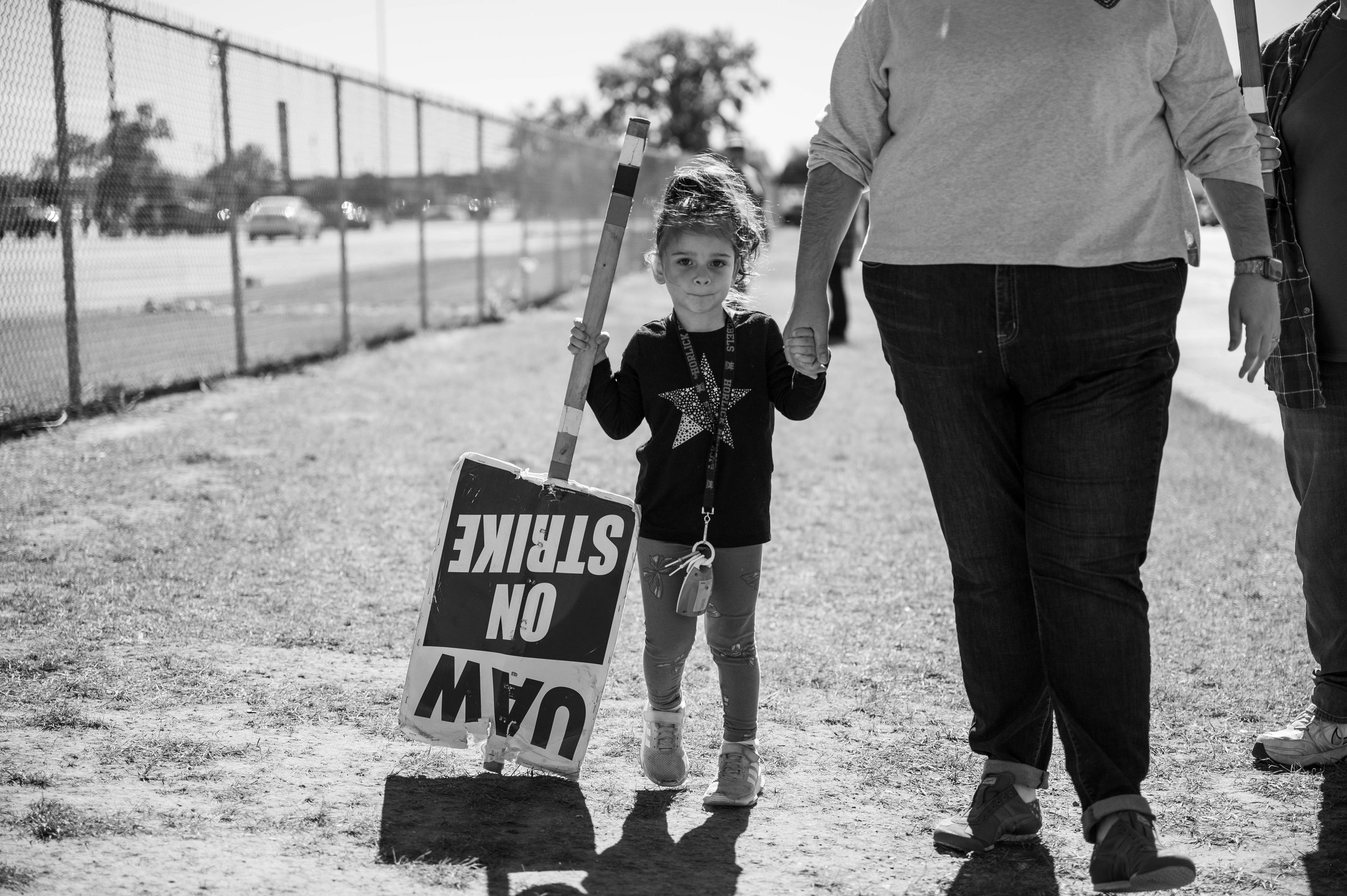 The daughter of a CNH worker at a UAW Strike in Wisconsin, 2022