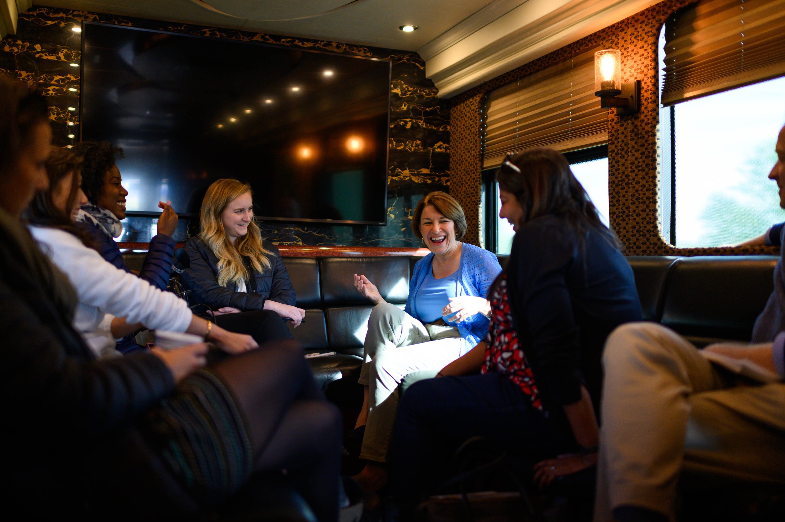 U.S. Senator Amy Klobuchar on her presidential campaign bus with reporters, Iowa, 2019