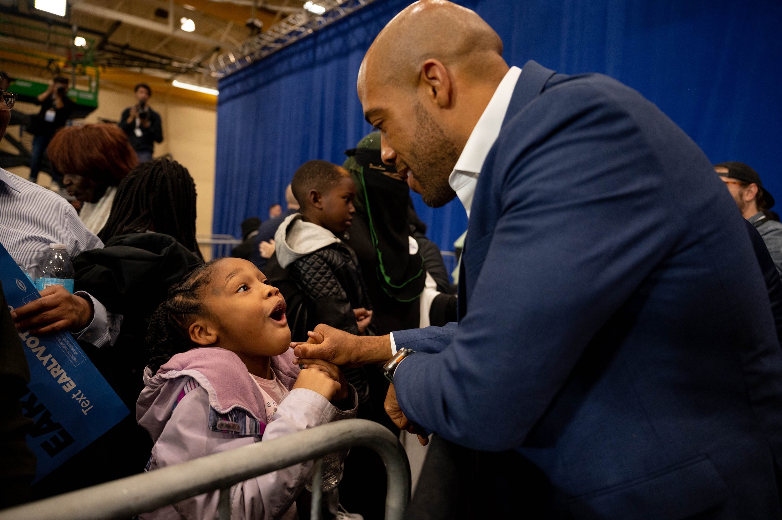 Democratic nominee for U.S. Senate, Lt. Governor Mandela Barnes meets a young supporter at a campaign rally in Wisconsin, 2022