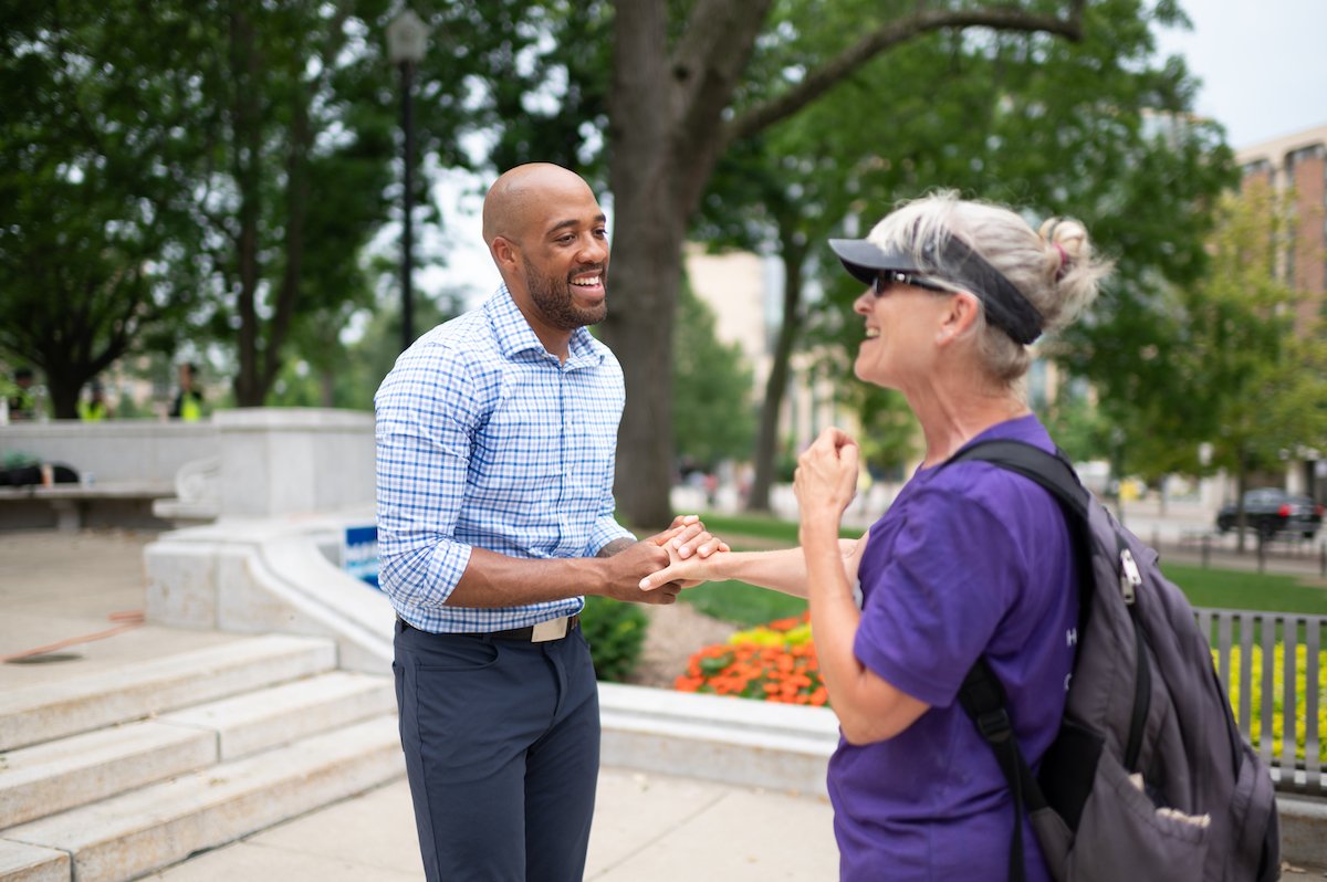 U.S. Senate candidate, Lt. Governor Mandela Barnes, with a supporter at a campaign event in Madison, Wisconsin, 2022