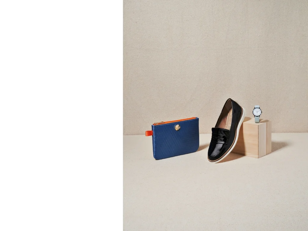 Little Anything bag by Taikka; vegan patent loafer by Wills; black and white face watch by Votch.