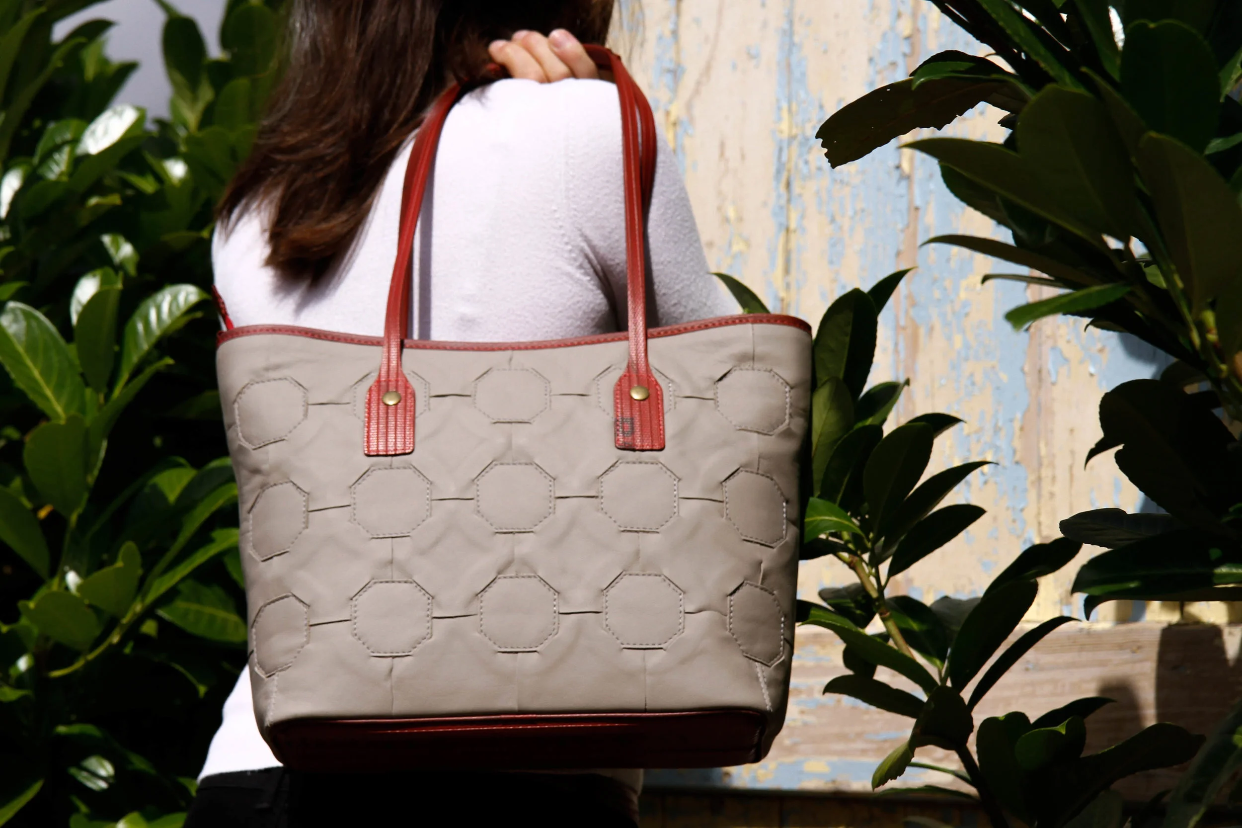 Waste leather is handcut and handwoven into a single ‘skin’ and made into beautiful totes and bags. Picture: Elvis & Kresse.