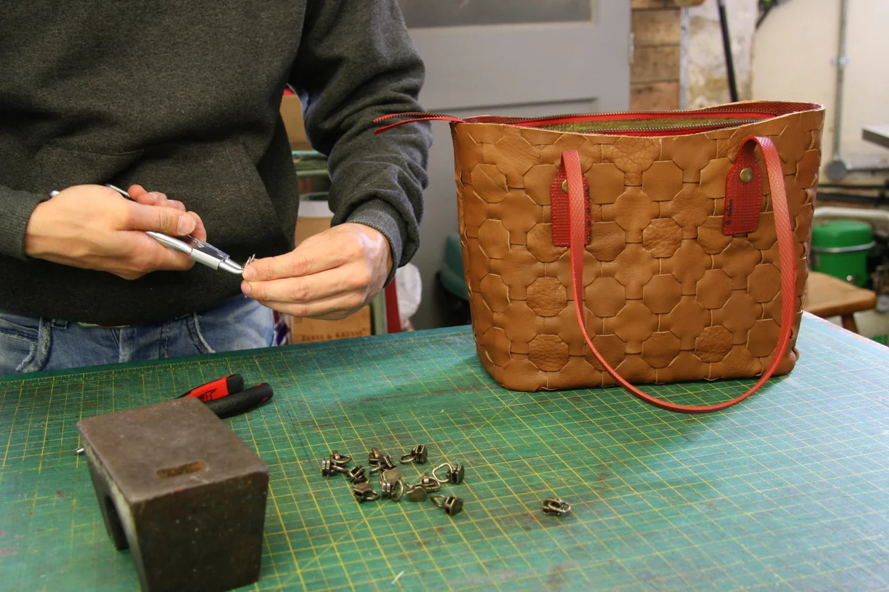 Elvis & Kresse make luxury accessories from reclaimed materials such as decommissioned firehose and leather offcuts. Picture: Elvis & Kresse.