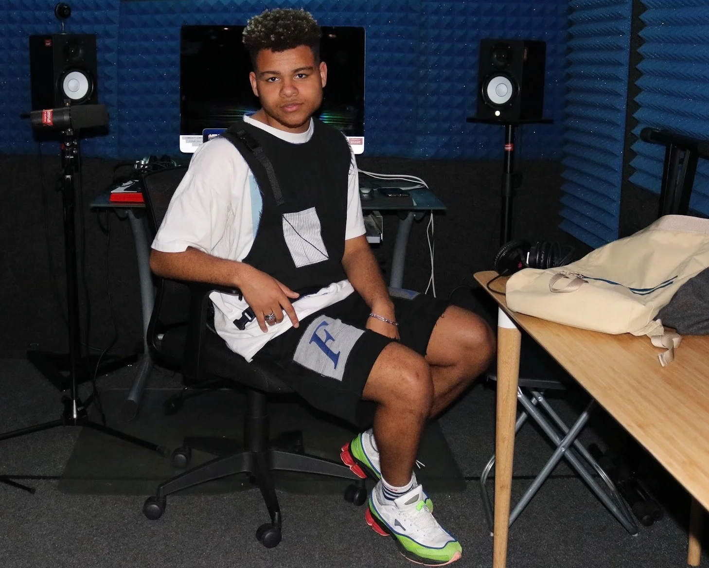 Nate wearing “FF" Patchwork Sweat Shorts.