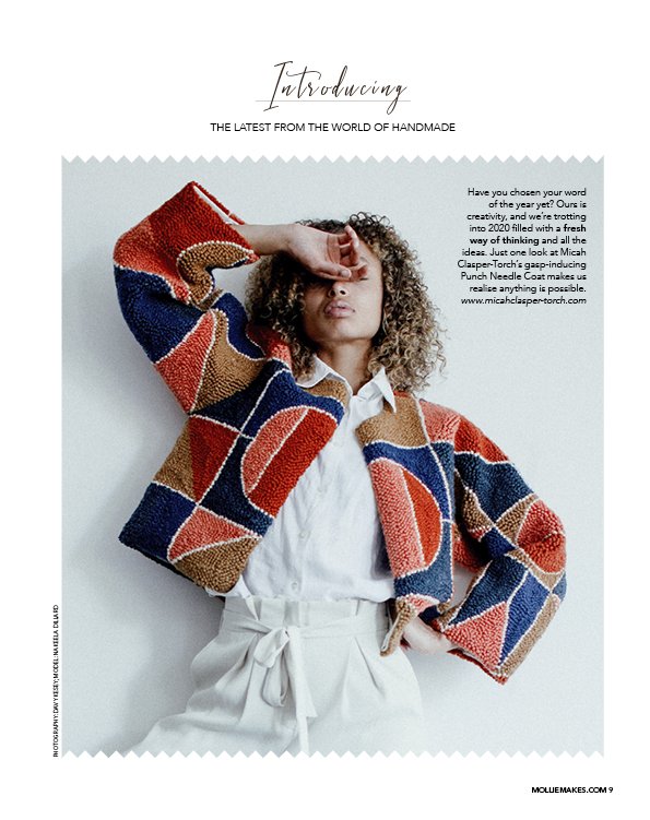 Image from Mollie Makes Magazine featuring a mixed race curly haired model with her hand over her eyes wearing Micah Clasper-Torch's Marfa punch needle coat