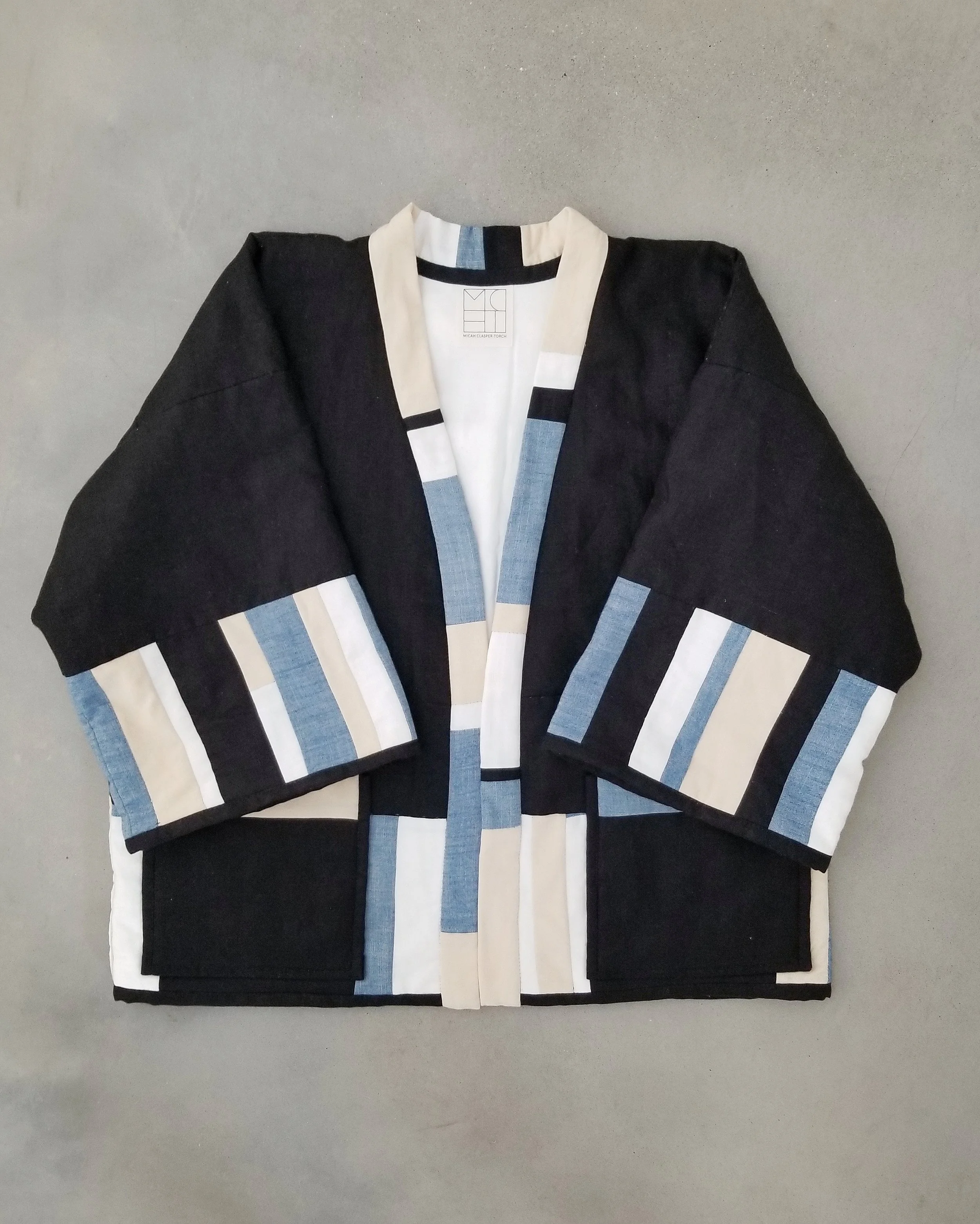 Quilted-Coat-MicahClasperTorch.jpg