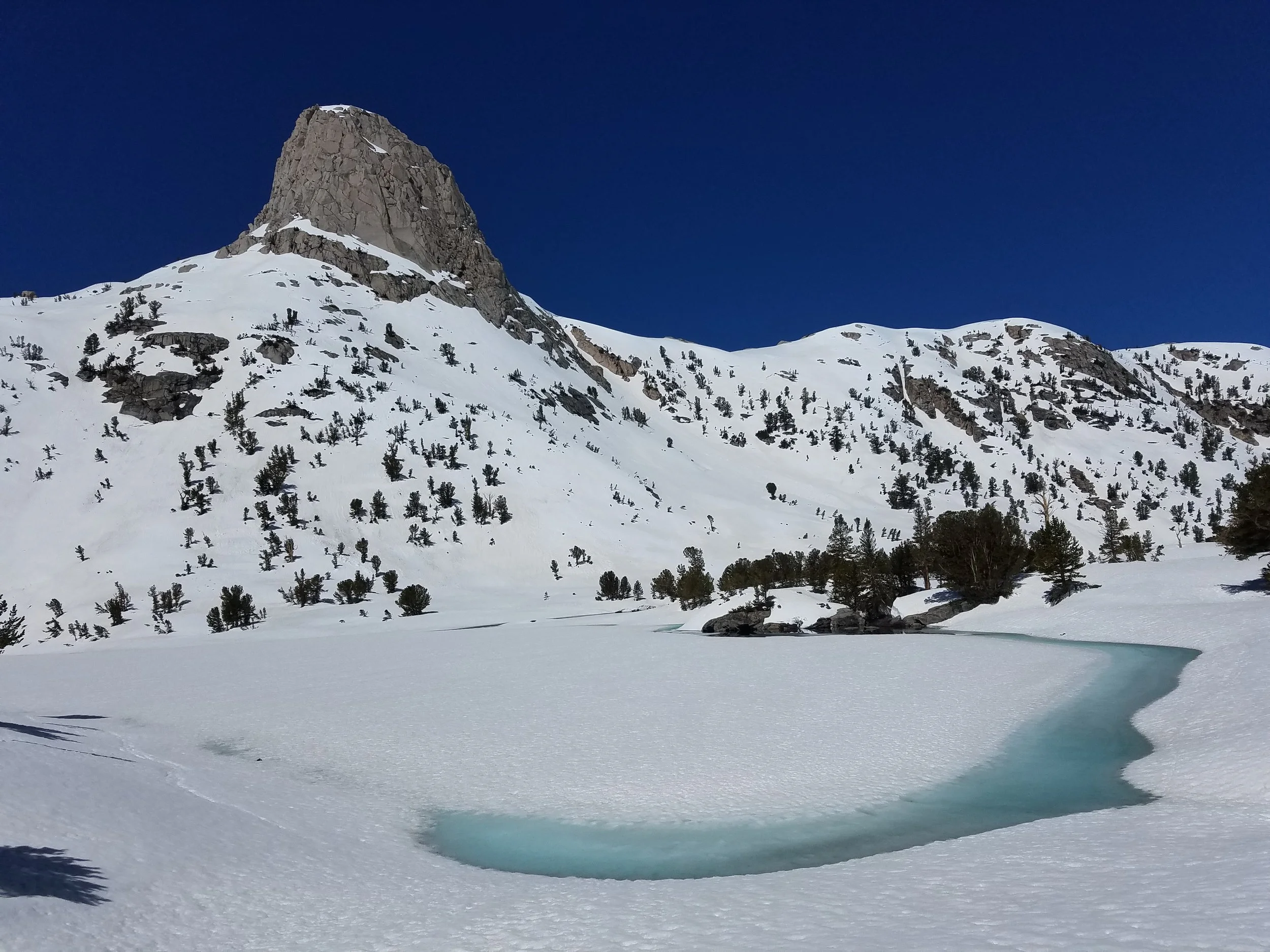 Beautiful, frozen Rae Lakes. Stay here for a mind-blowing zero!