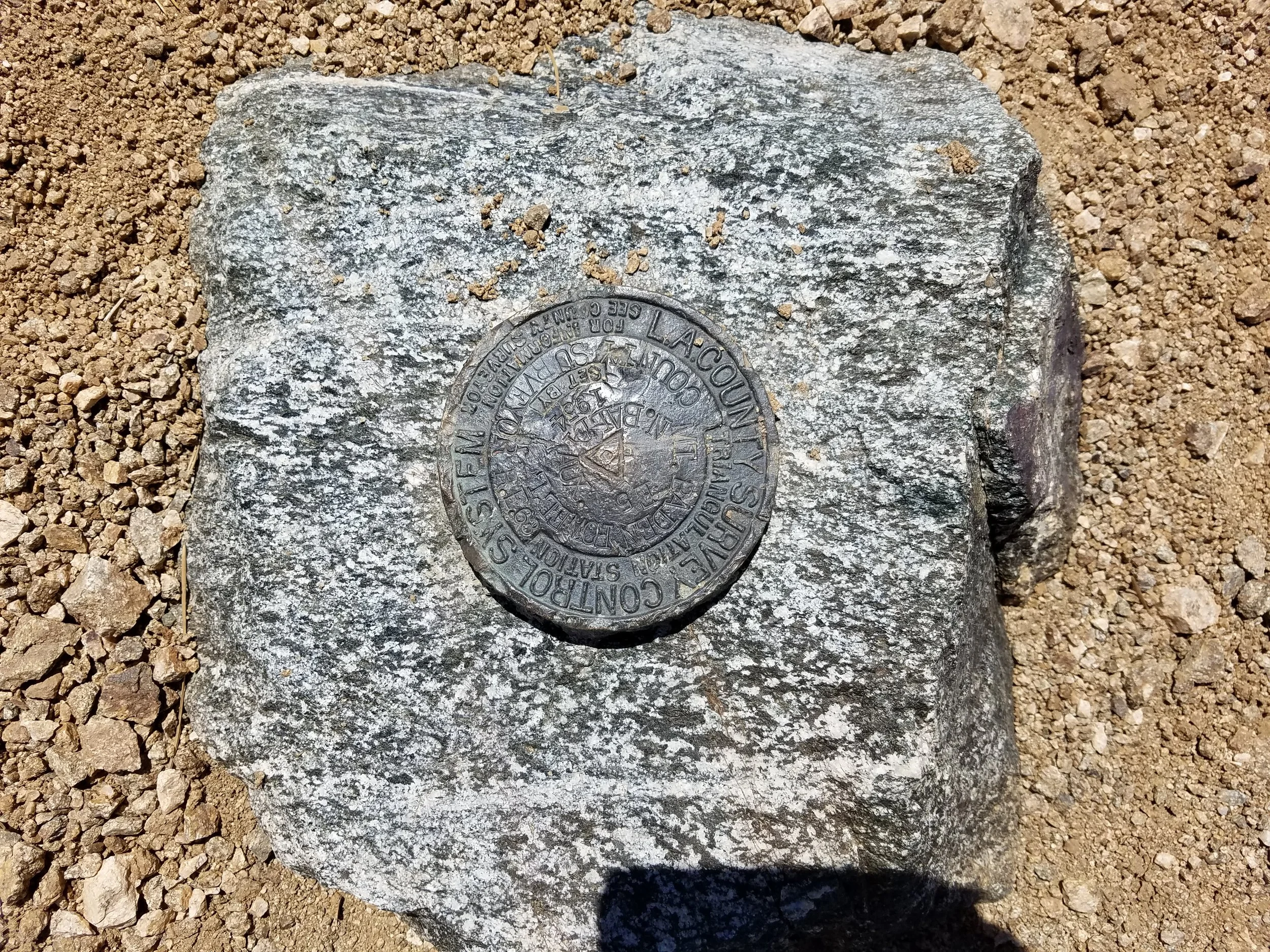 Survey marker at the summit of Baden-Powell.