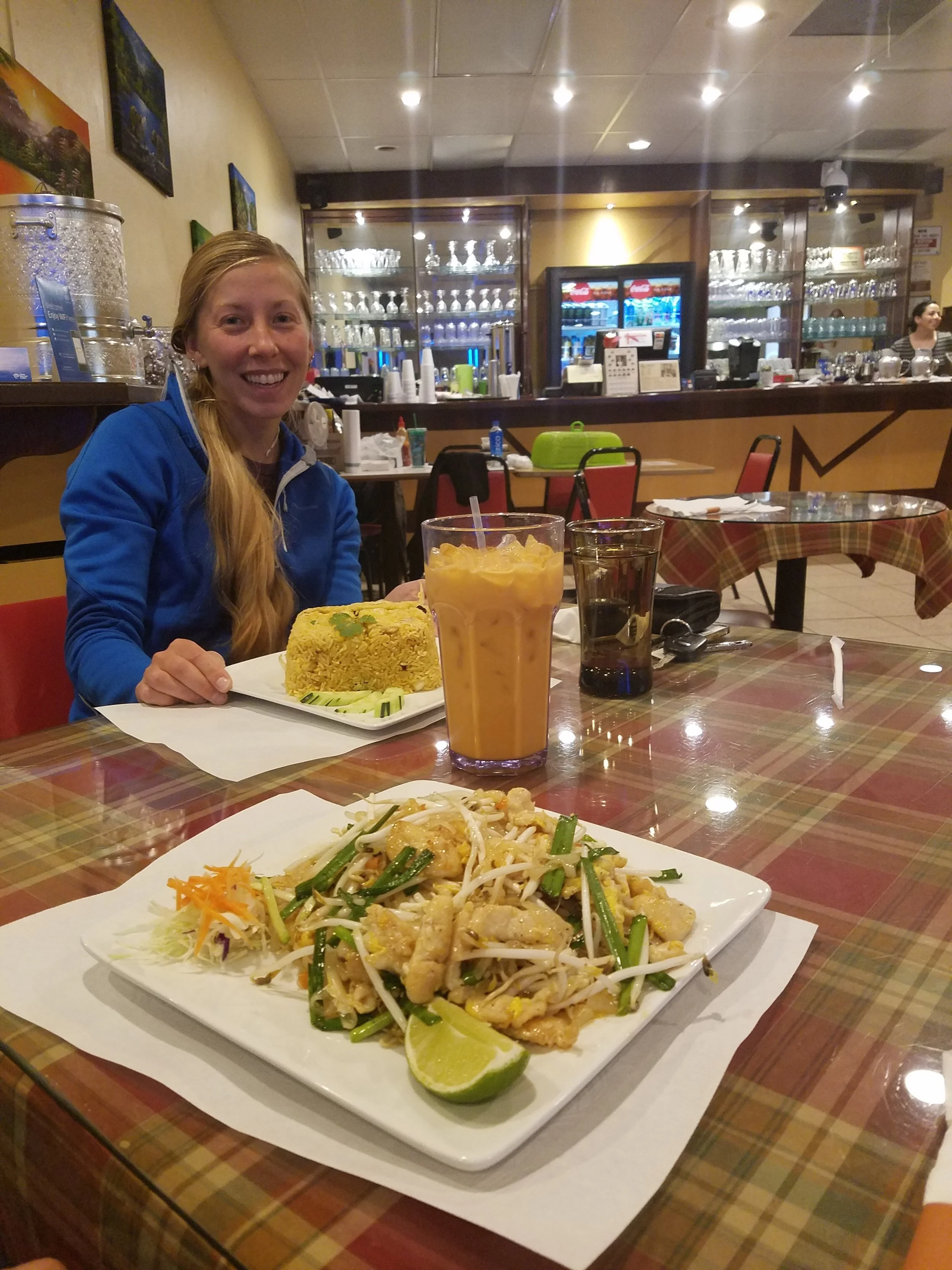 Melanie sitting down to crush some piles of amazing Thai food with me. Hiker happiness overload!!