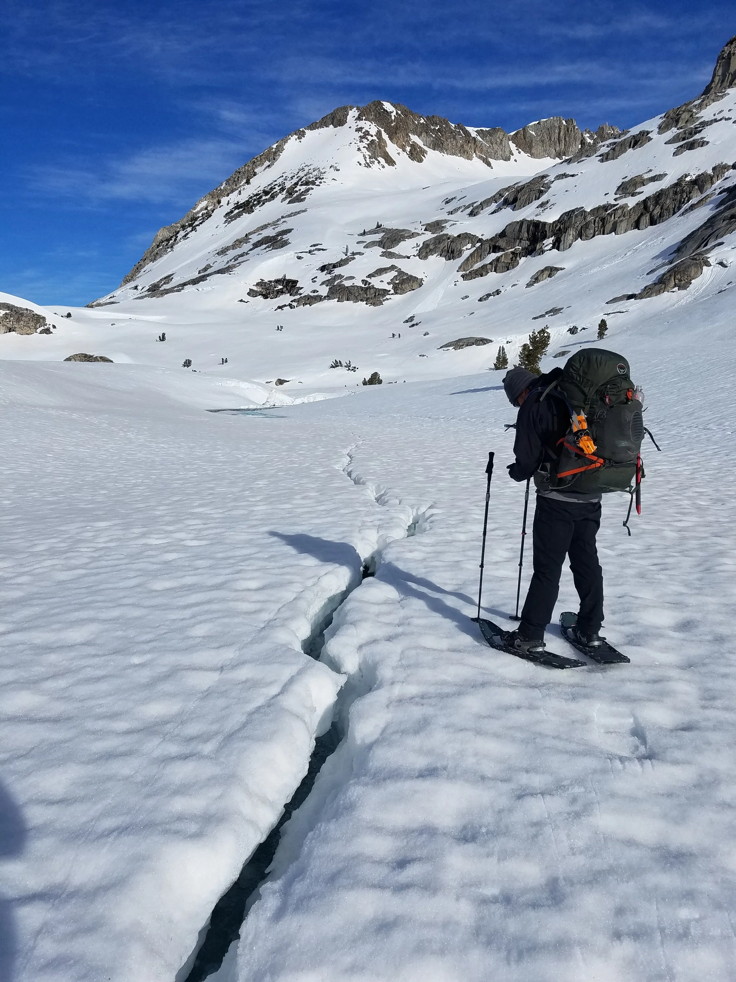 Bizarre, deep cracks wound through the surface of the lakes.