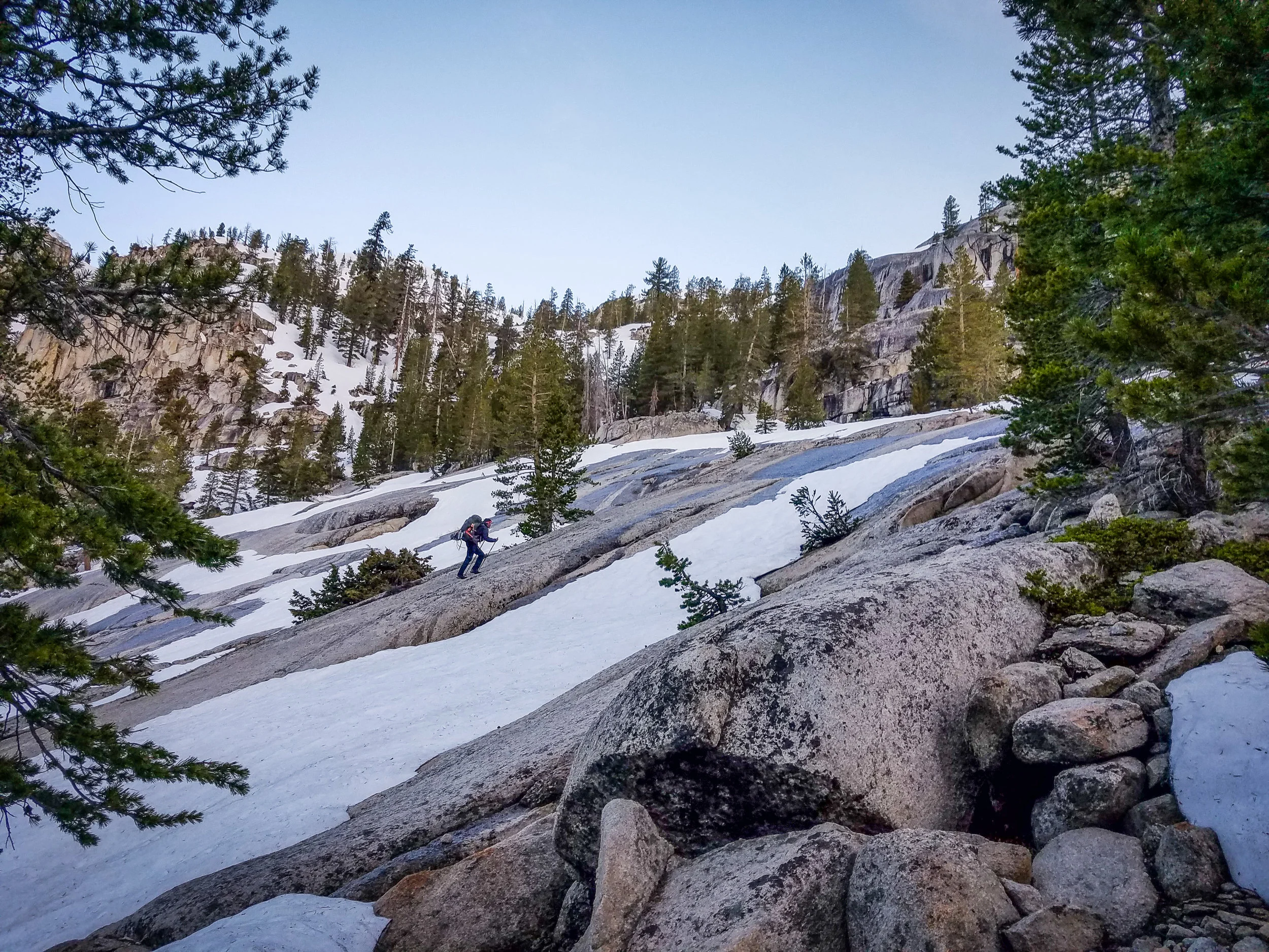 Amped moving up the granite slabs toward the Silver Creek waterfall.