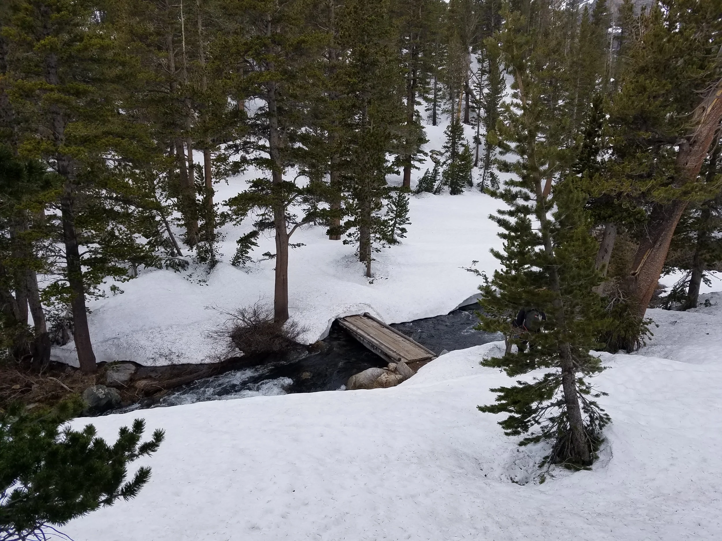Crossing the outlet of Purple Lake. Always feels good seeing signs of civilization.