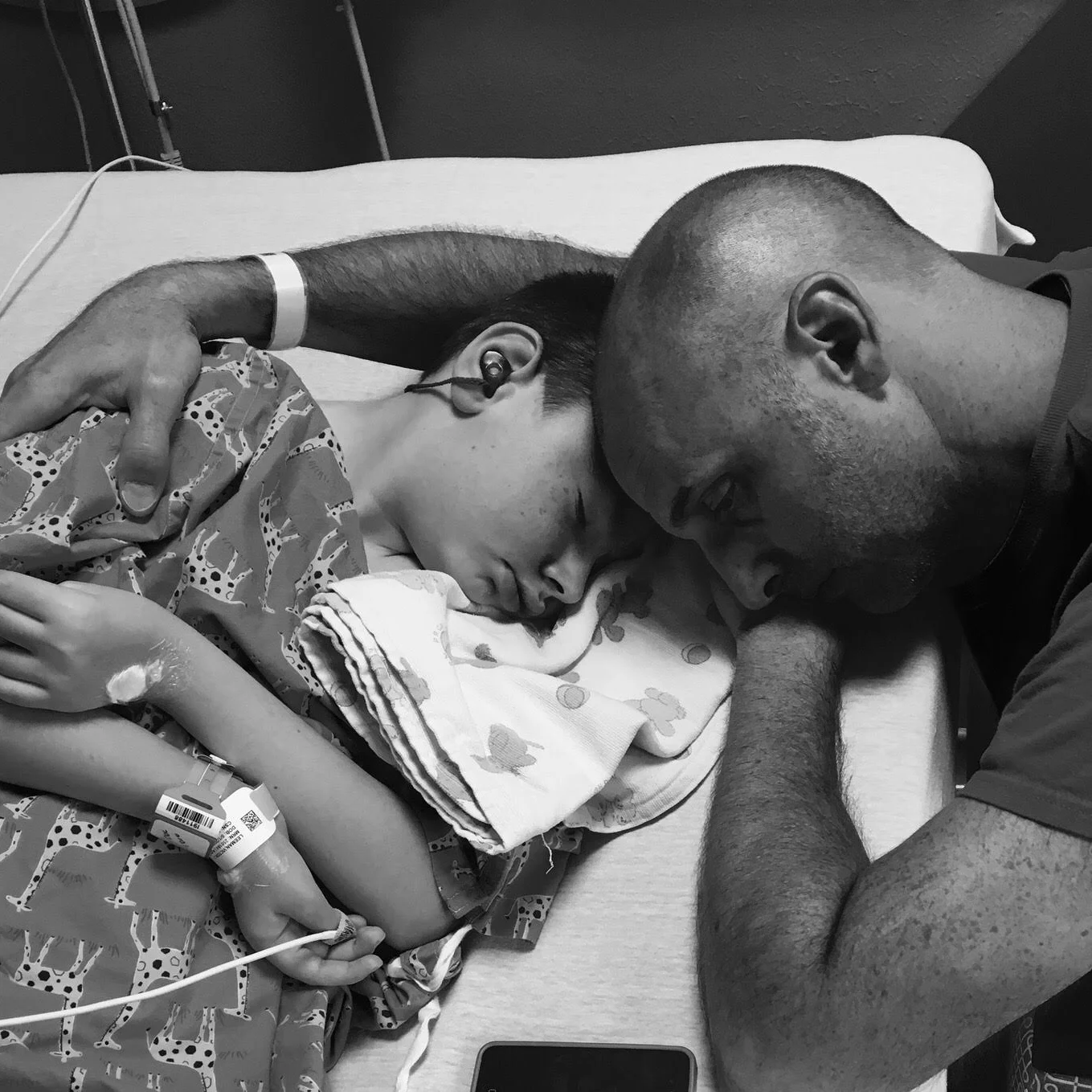 Victor and his dad embrace during a recent hospital stay.