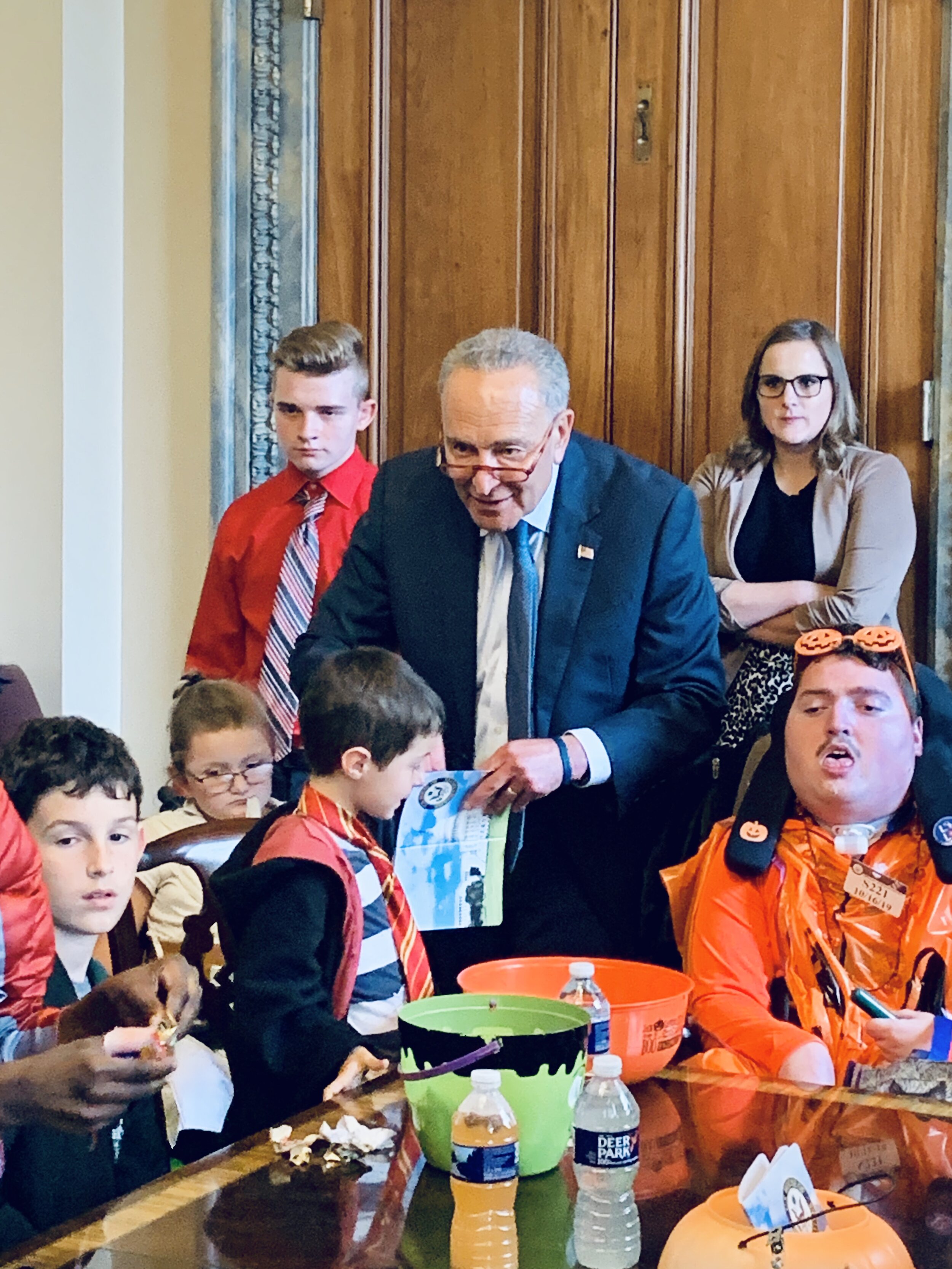  The Senate Minority Leader hands out candy during a Little Lobbyists’ trick or treat day on Capitol Hill. 