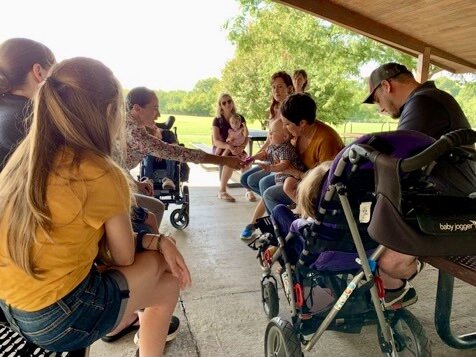  Little Lobbyists children engage with their congressional representative at a local playground. 
