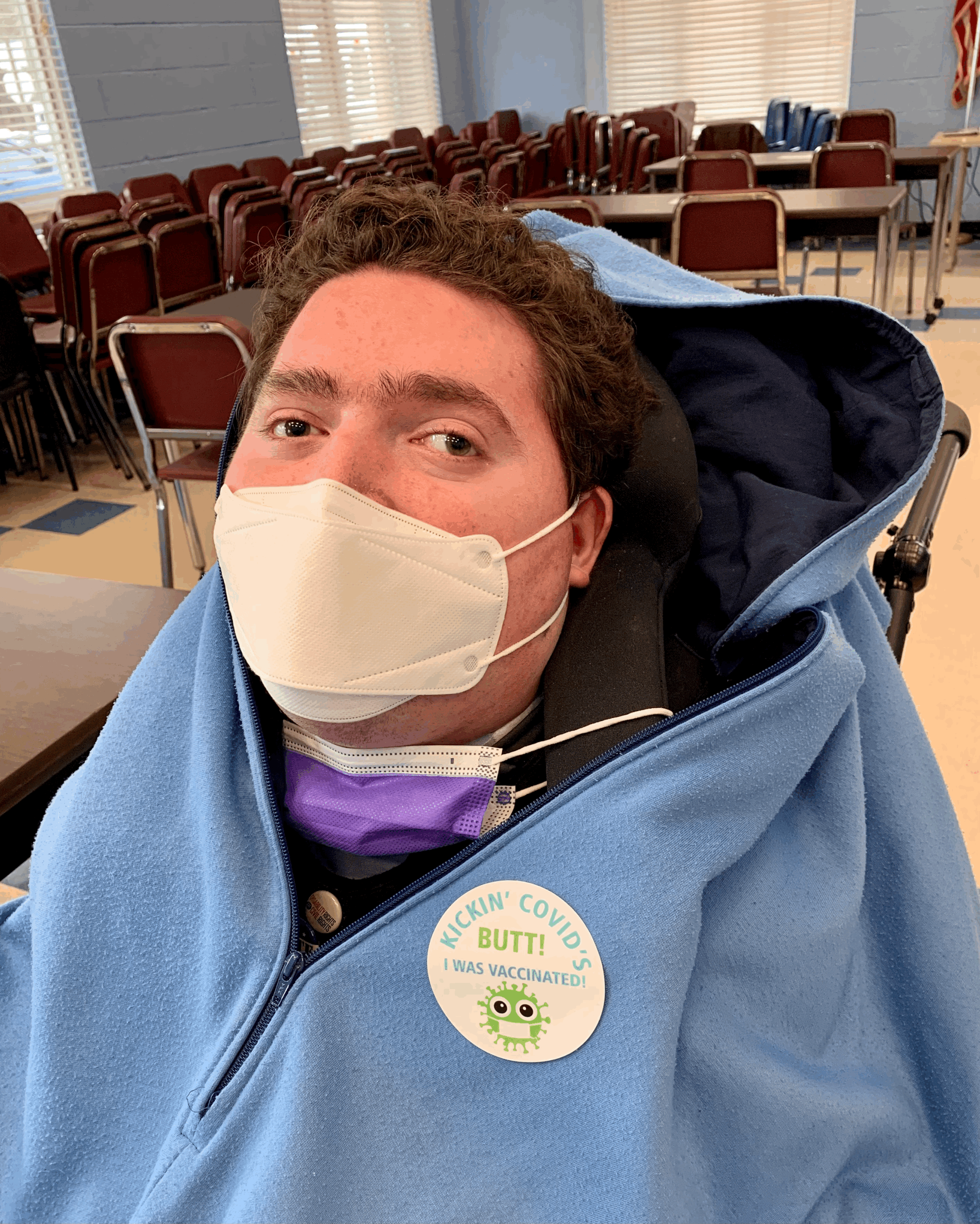 Rob Stone, 23, after his vaccination in mid-February. The process wasn’t easy, but he got lucky. [image description: