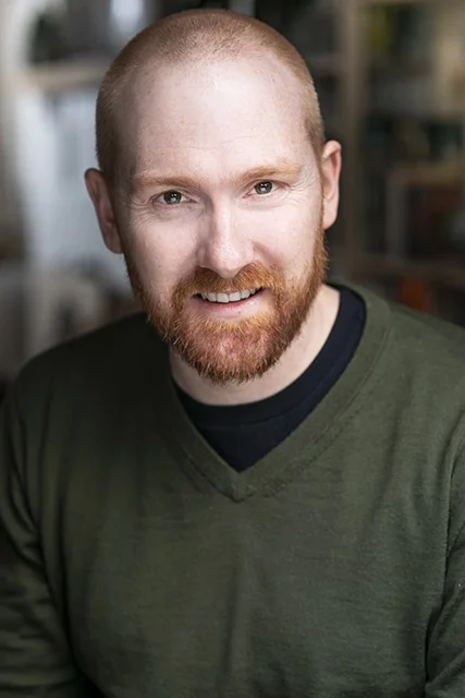 SMALL HEADSHOT 1 AC.jpg