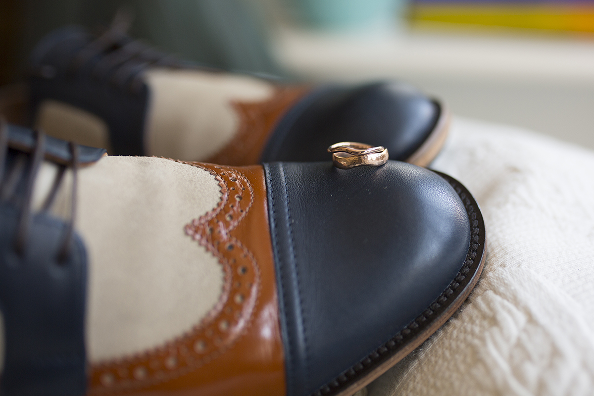 grooms wedding shoes and wedding bands Sophie Lake Photography