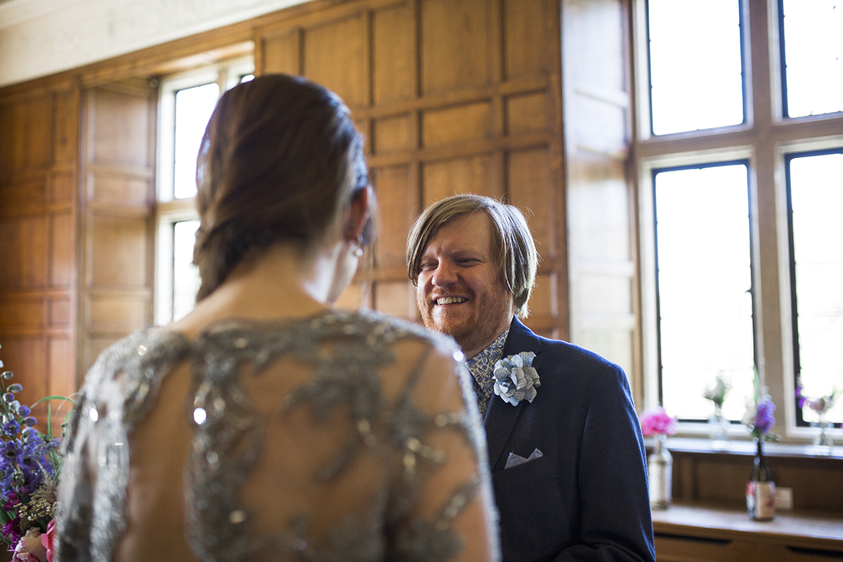 Groom laughing Sophie Lake Photography