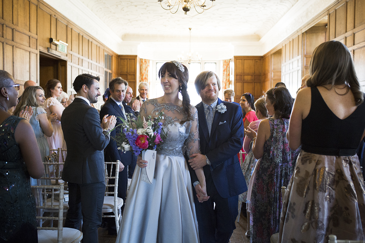 Bride and Groom Walking aisle Sophie Lake Photography