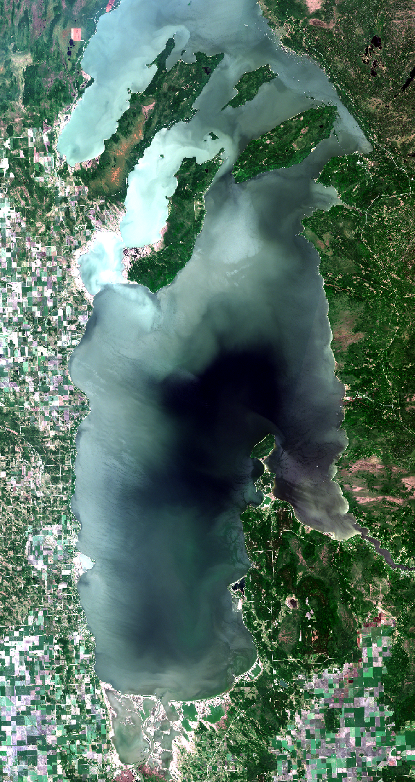 June 20, 2018. Cloud free images are brighter in appearance than those with some cloud present. Clouds increase the range of data values in satellite images which decreases contrast for land and water features. Comparisons of color among images over time require standardization not applied here. Visual comparisons within a single image are meaningful. Click here for high resolution satellite image.