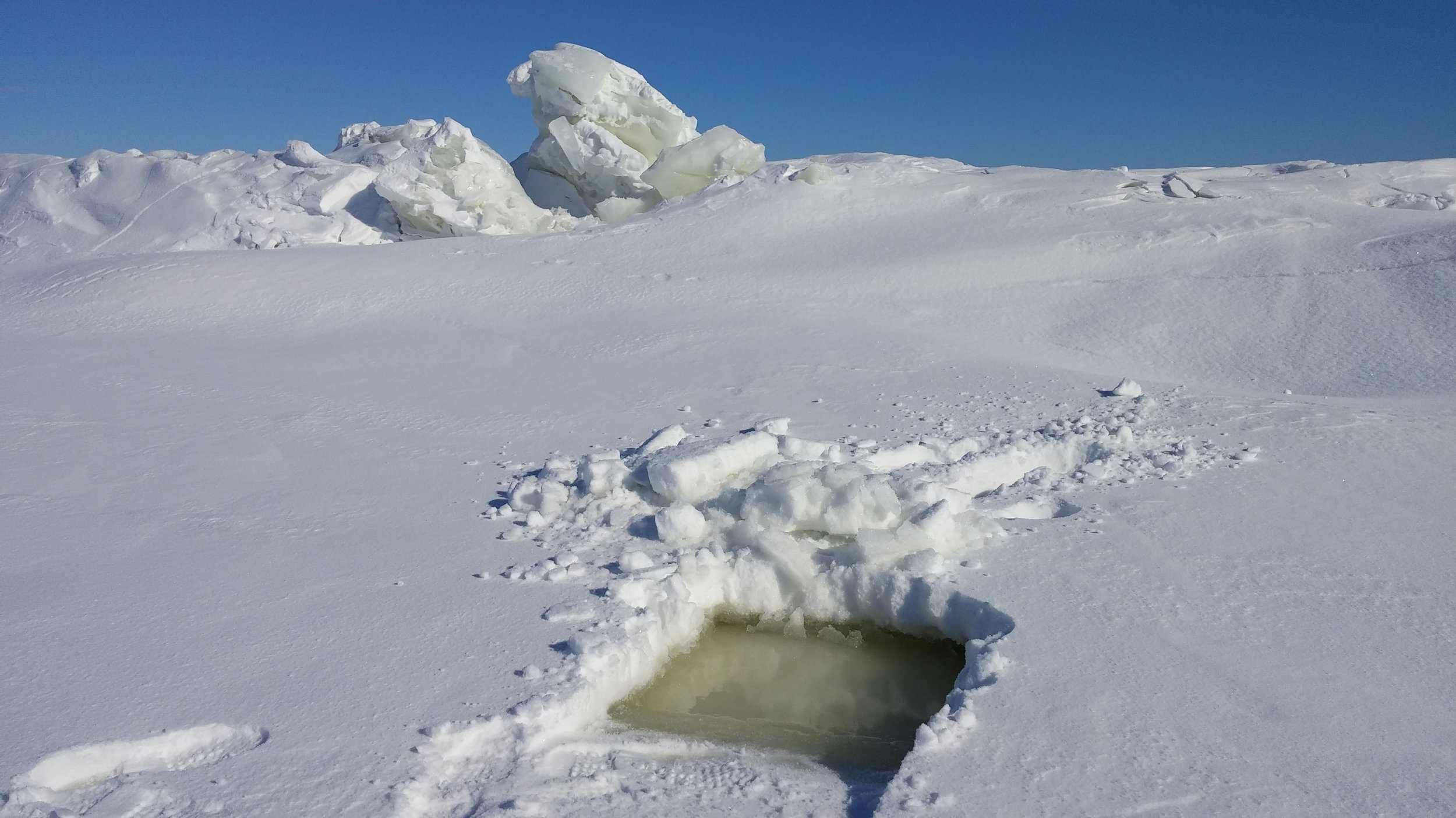 Ridges flood snow with lake water during uplift - winter period.