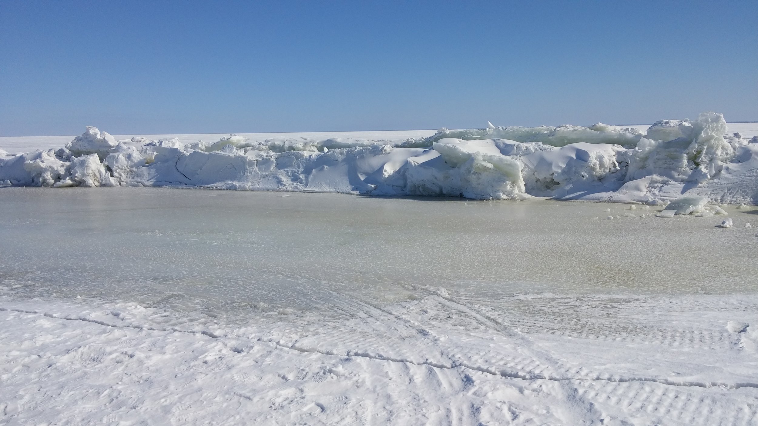 Pressure ridges are ice deformations that include troughs on either side. The ridge and troughs are relatively weak ice and decay early to form a lead.