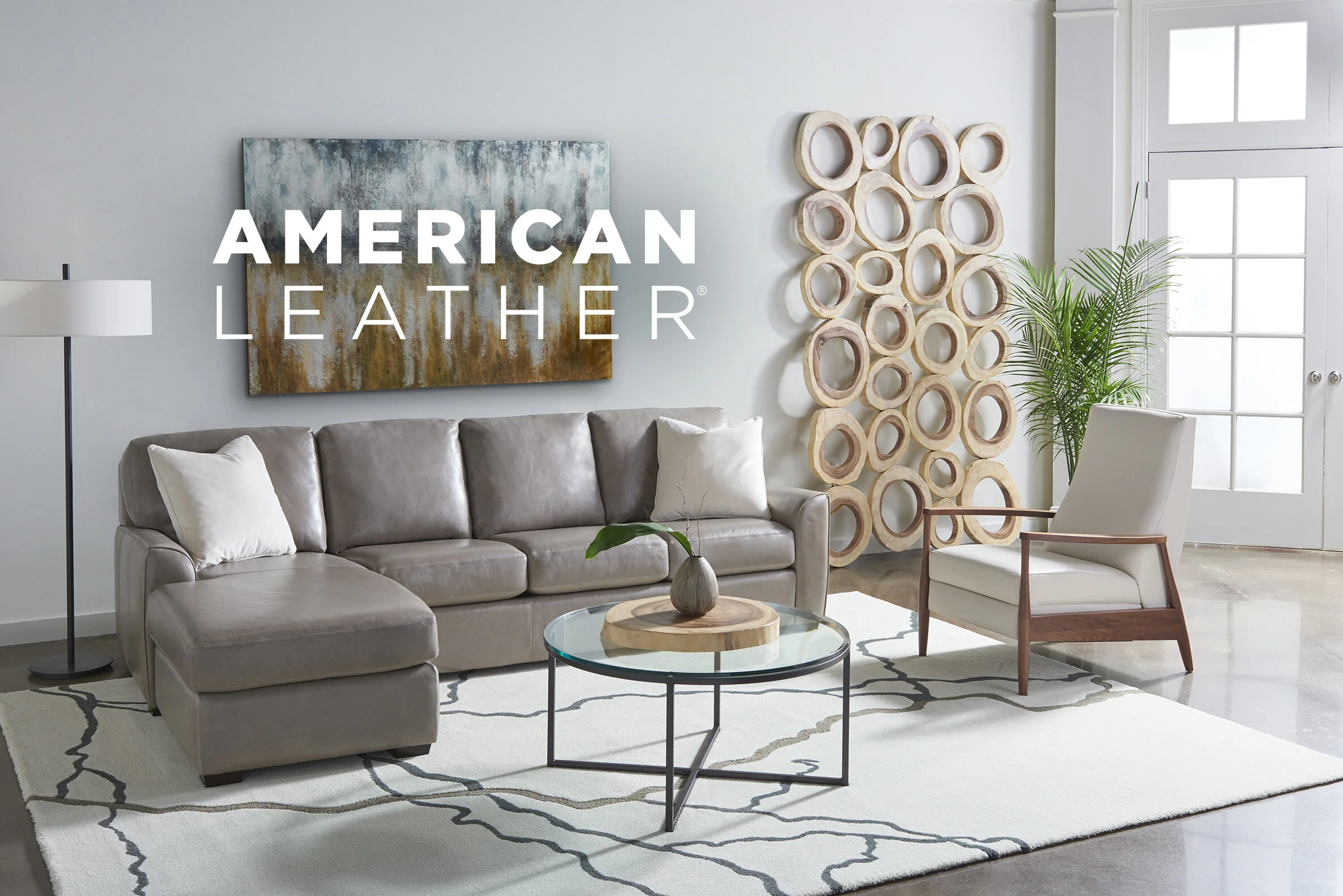 Kaden-ChaiseSectional-Pillows-Aston-Re-InventedRecliner-LOGO.jpg