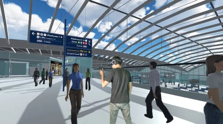 Participant in VR testing wayfinding signs in the HS2 Old Oak Common model