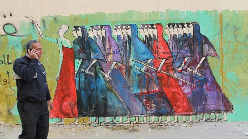“Marching Women,” a mural in Cairo dedicated to the women of the Egyptian Revolution. Image: Schweizer Radio und Fernsehen
