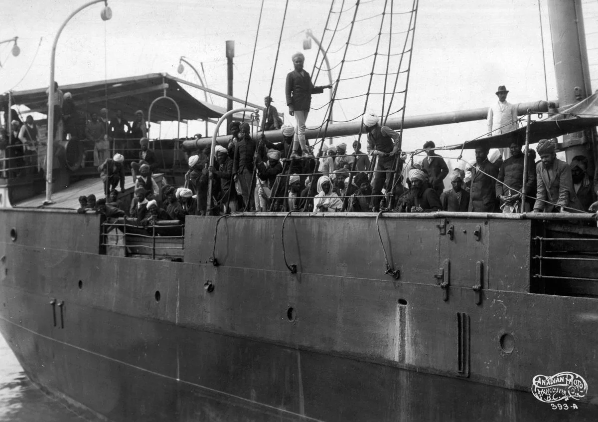 Komagata Maru steamship arrives in Vancouver, BC carrying 376 passengers of Sikh, Muslim and Hindu origin. Image: Leonard Frank/Vancouver Public Library