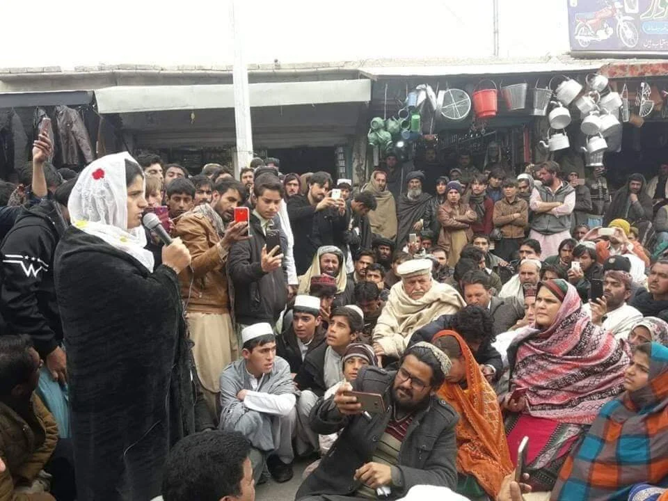 One of PTM’s women leaders Wranga Luni speaking at a gathering. Wrunga is also the sister of late Arman Luni who was allegedly tortured and killed by police for being an active member of PTM. Image: WDF Karachi (Facebook)