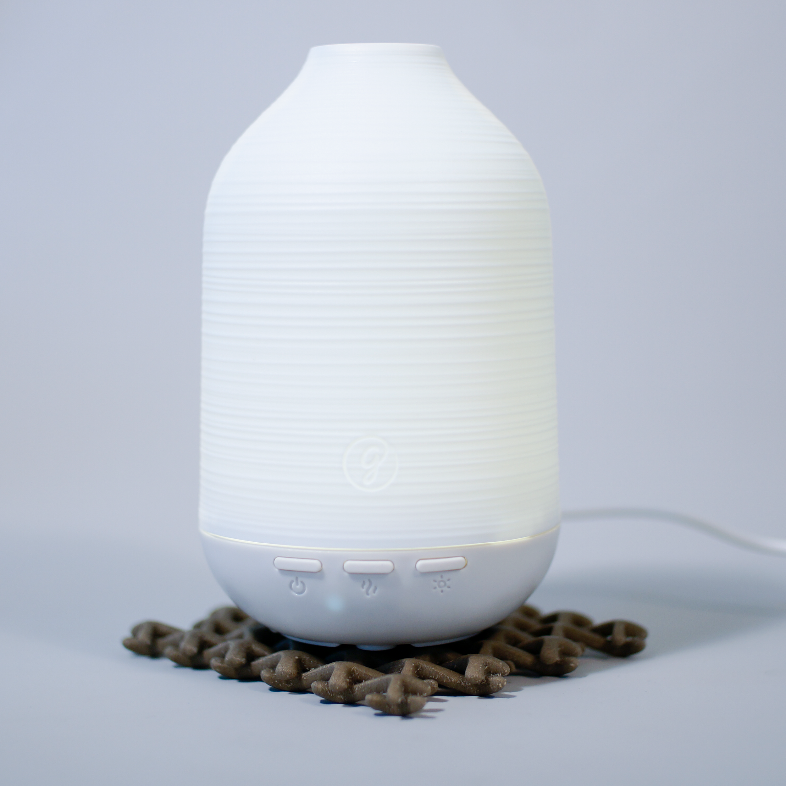 Designed during my time at Essential, The Glade Aromatherapy Diffuser is made for relaxation through scent and sight. Casting off an handmade inspired textured shroud, the warm light complements the natural scents to create an environment of respite