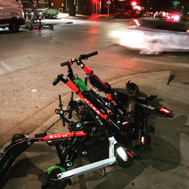 Scooters everywhere in Austin. BIg Texans, tattoos, beer, man buns and music!