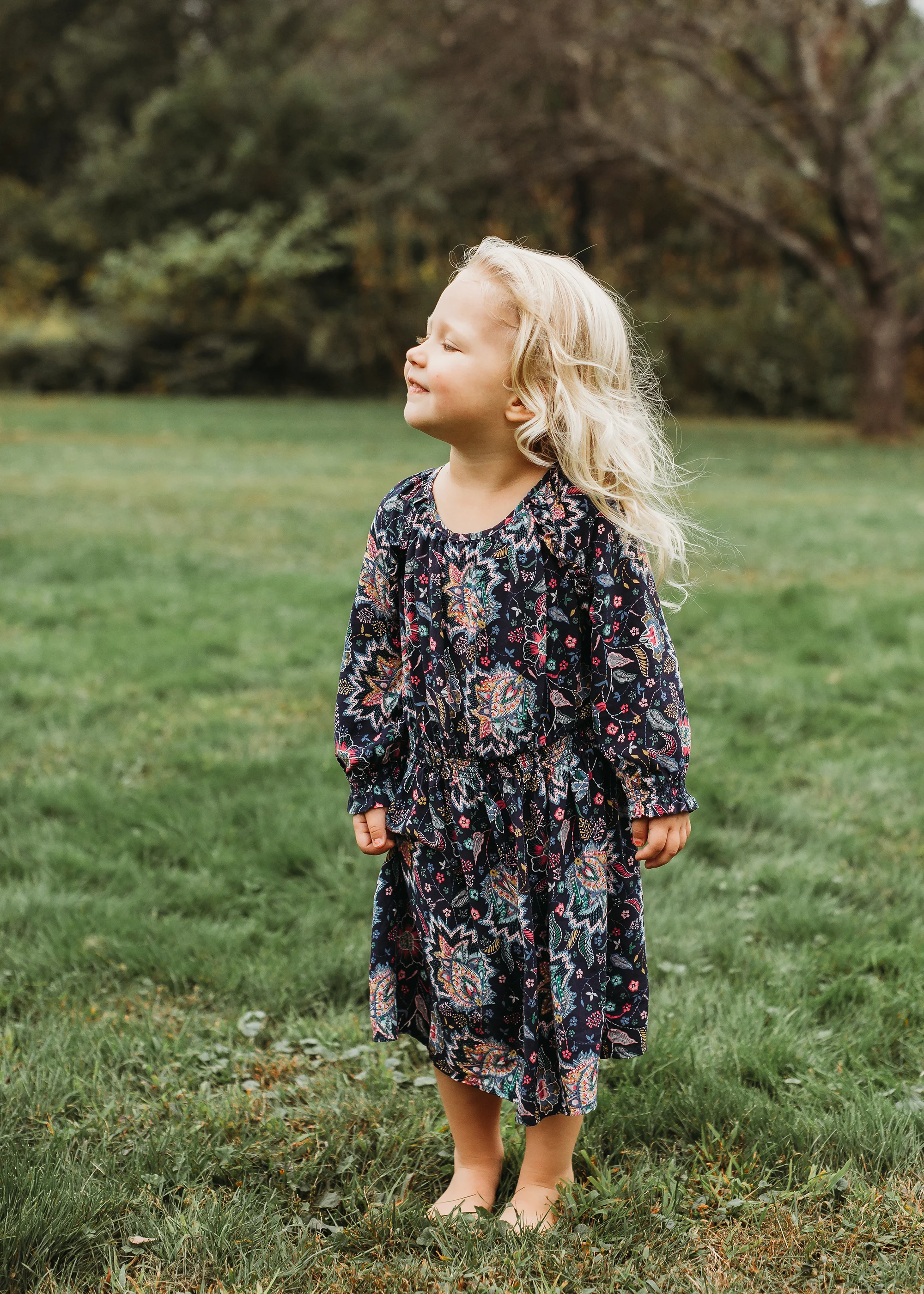 Toddler girl in boho dress for Sudbury family portraits. Boston family photographer, natural light, candid.